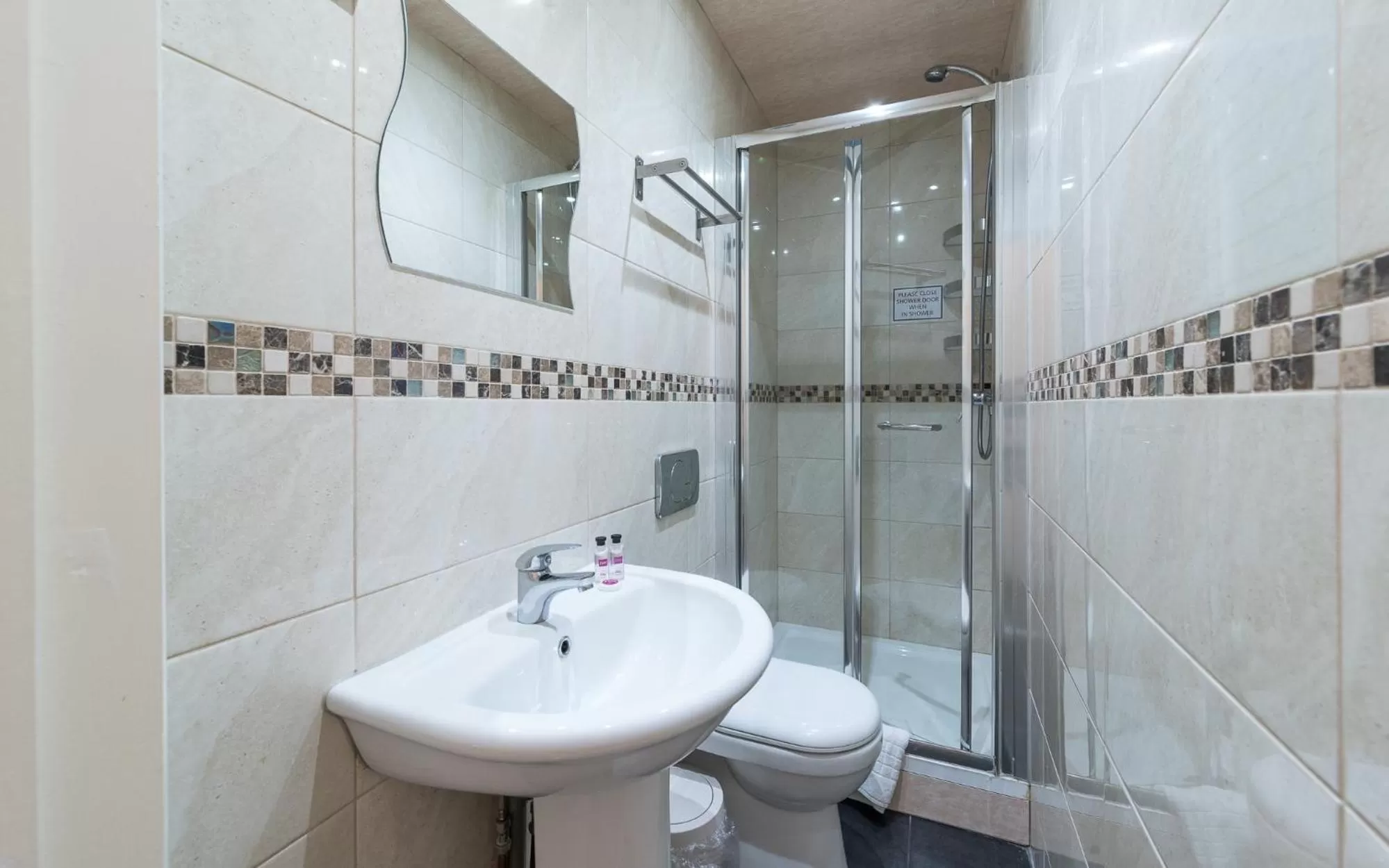 Bathroom in Hellenic Hotel by Saba