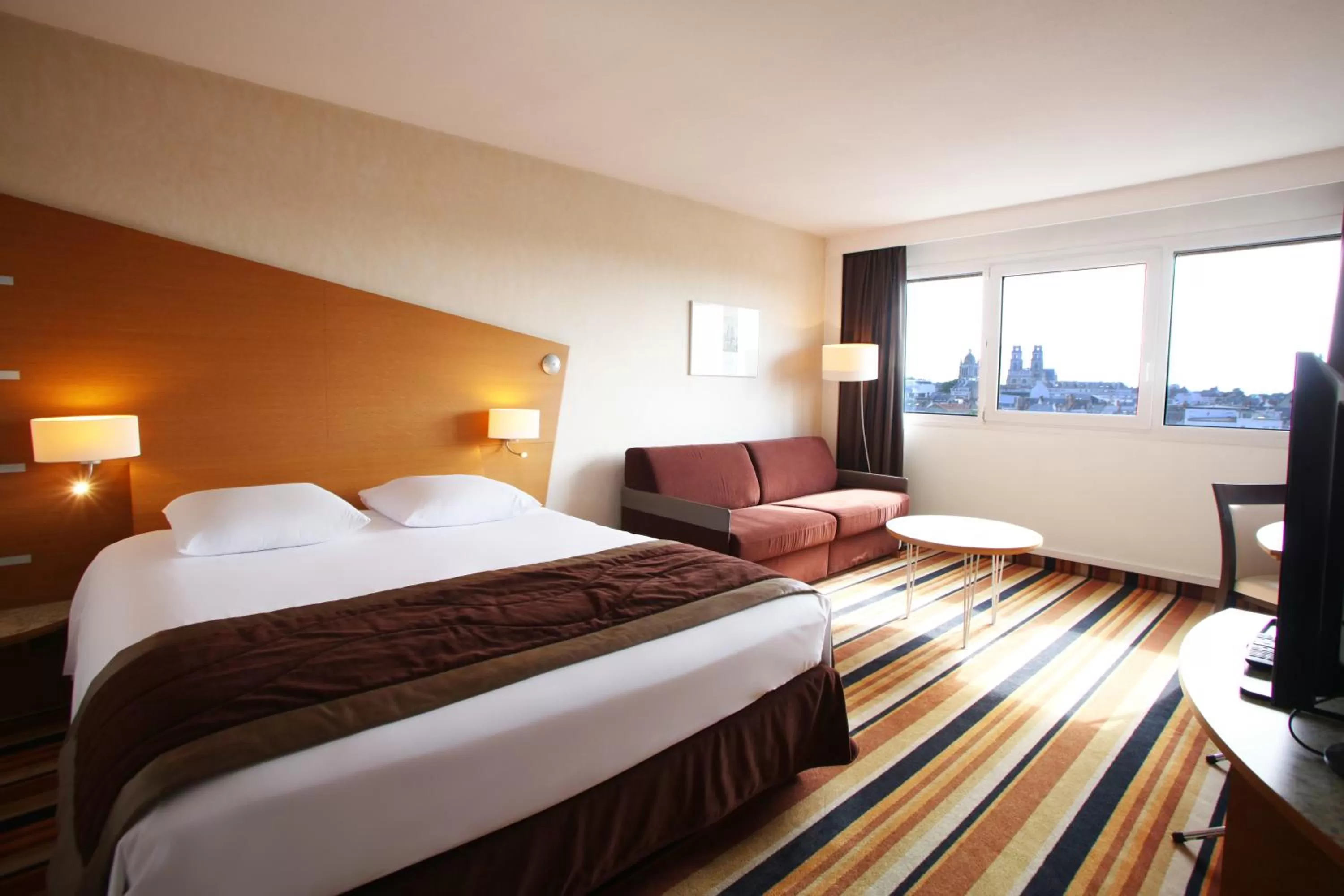 Photo of the whole room, Bed in Mercure Orléans Centre Bords de Loire