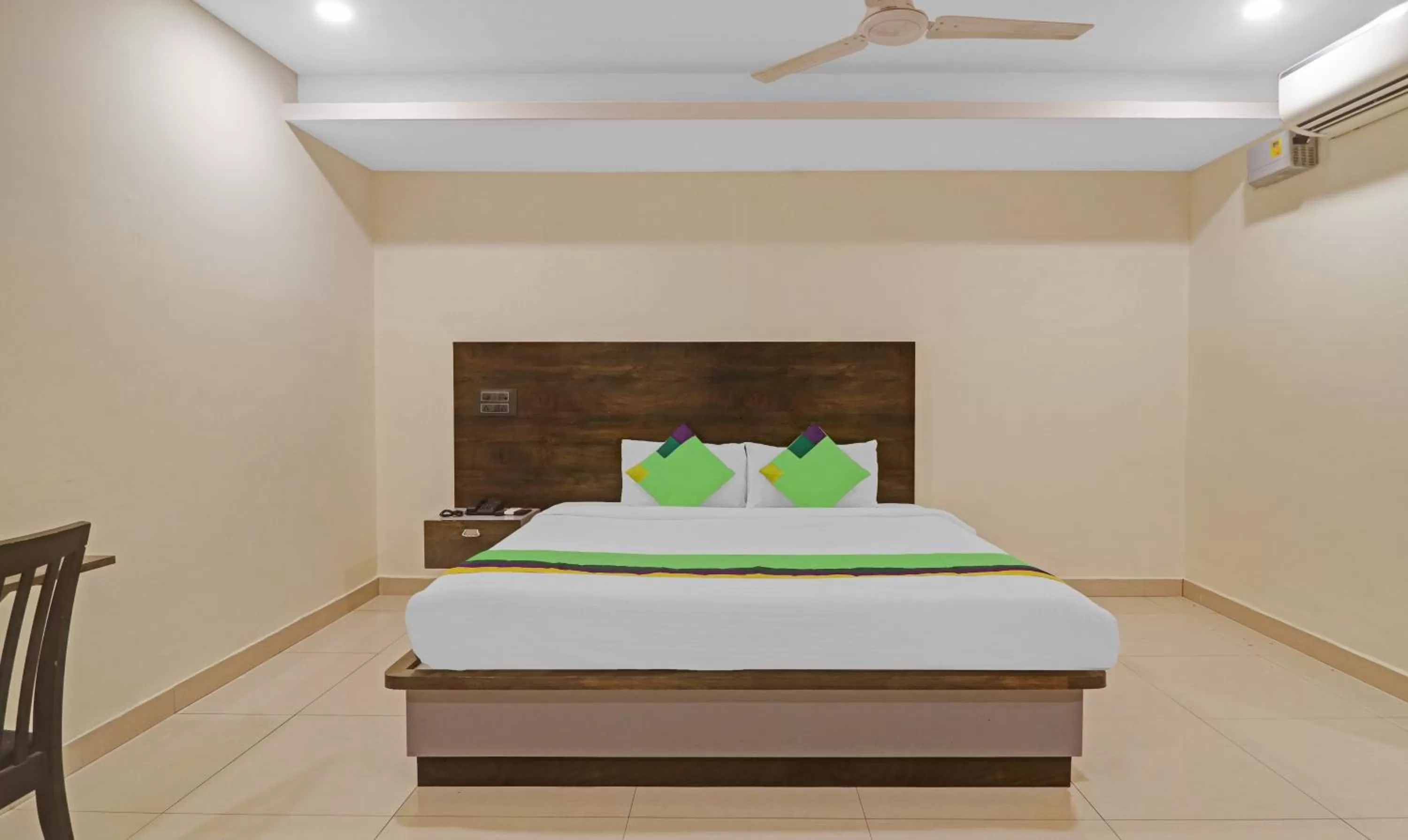 Bedroom, Bed in Treebo Trend Tee