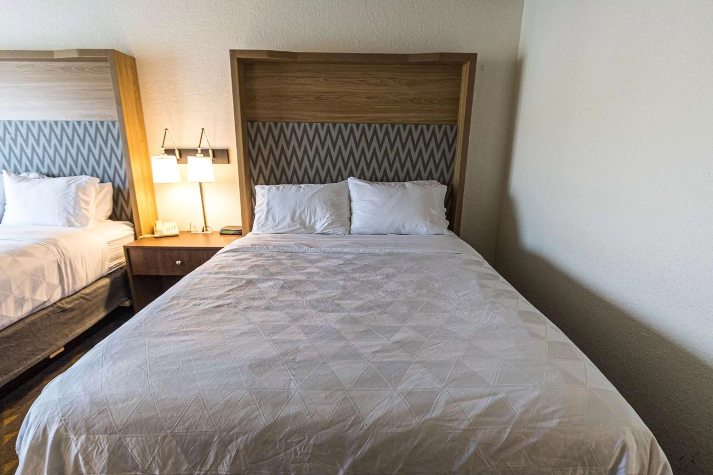 Queen Room with Two Queen Beds in Gateway Hotel & Convention Center Best Western Premier Collection
