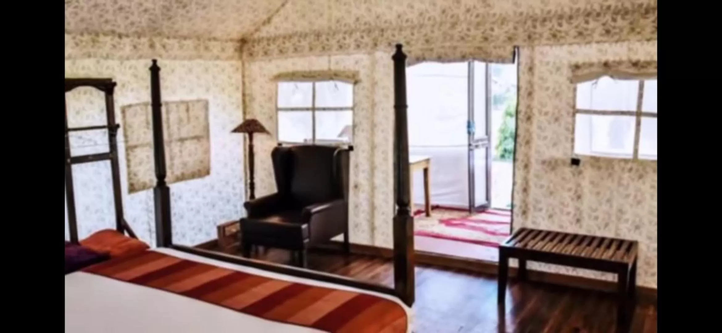 Bedroom, TV/Entertainment Center in Sultan Bagh Resort by The Sky Imperial