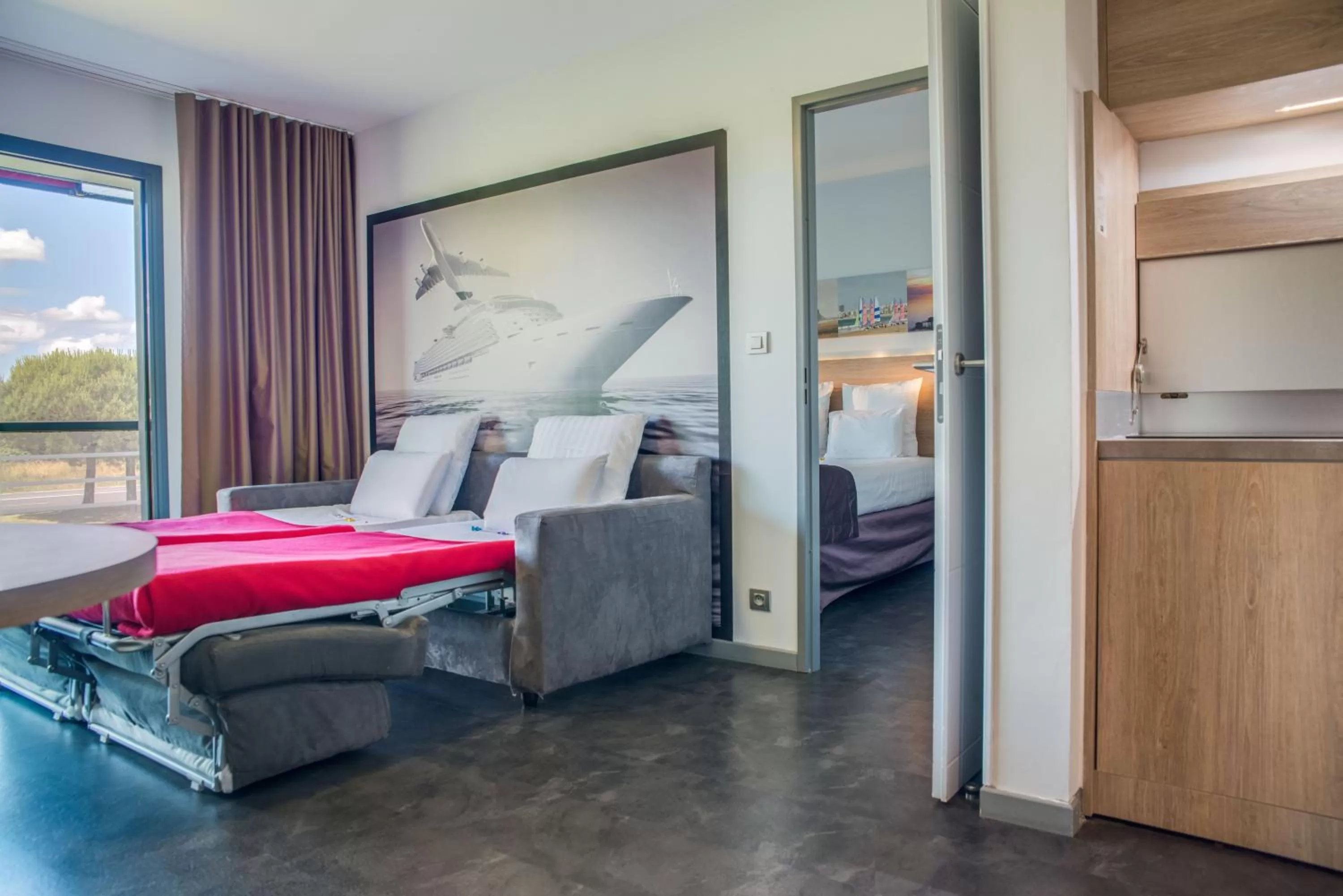 Photo of the whole room, Bed in Best Western Les Aureliades Saint Nazaire