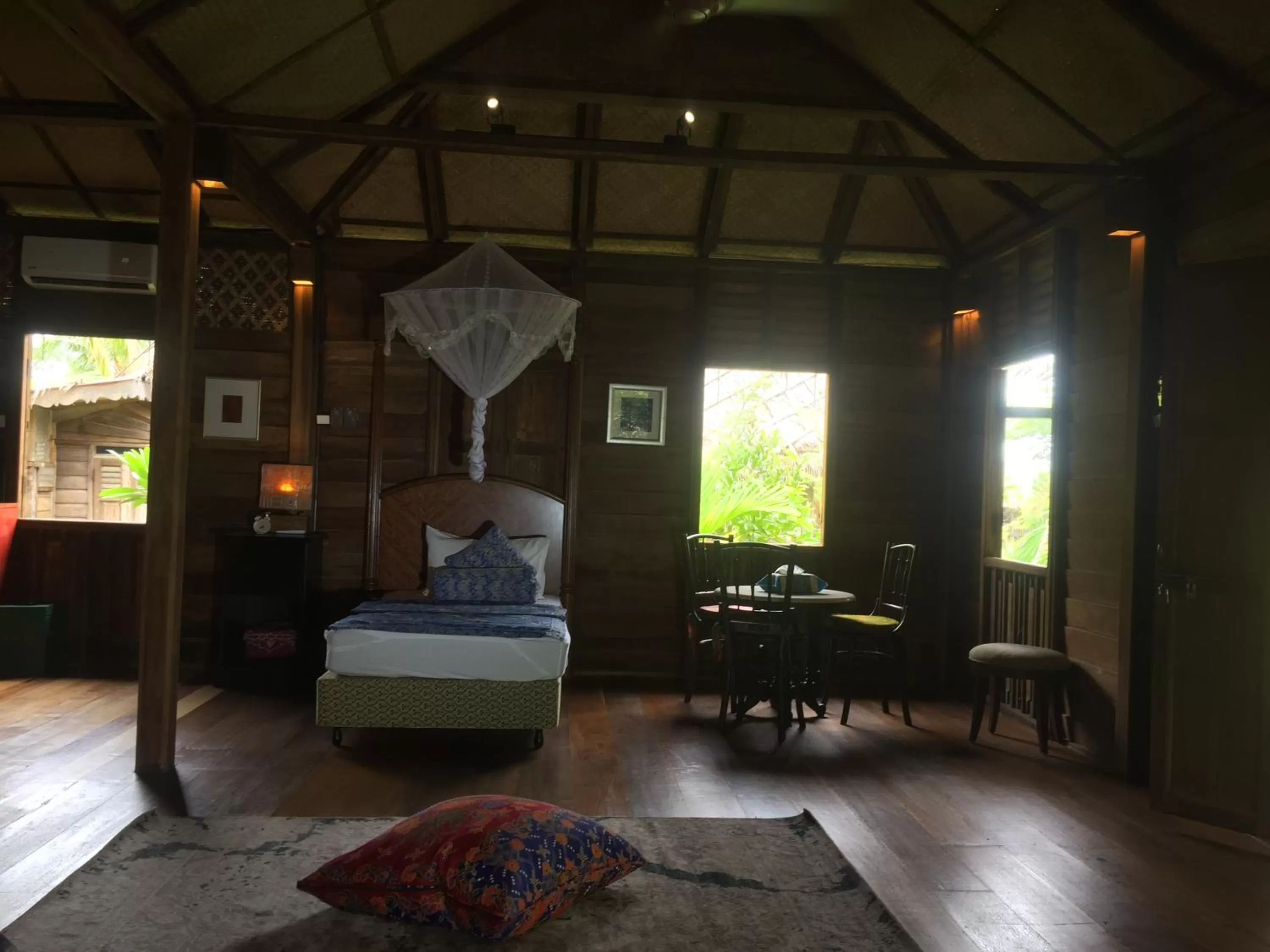 Bed in Kunang Kunang Heritage Villas