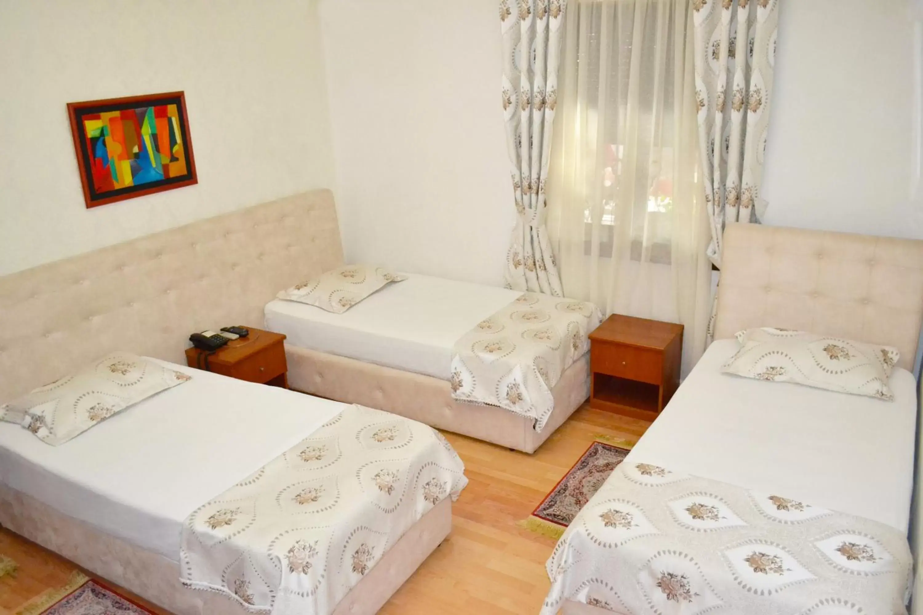 Classic Triple Room in Hotel Villa Tafaj Classic Triple Room in Hotel Villa Tafaj