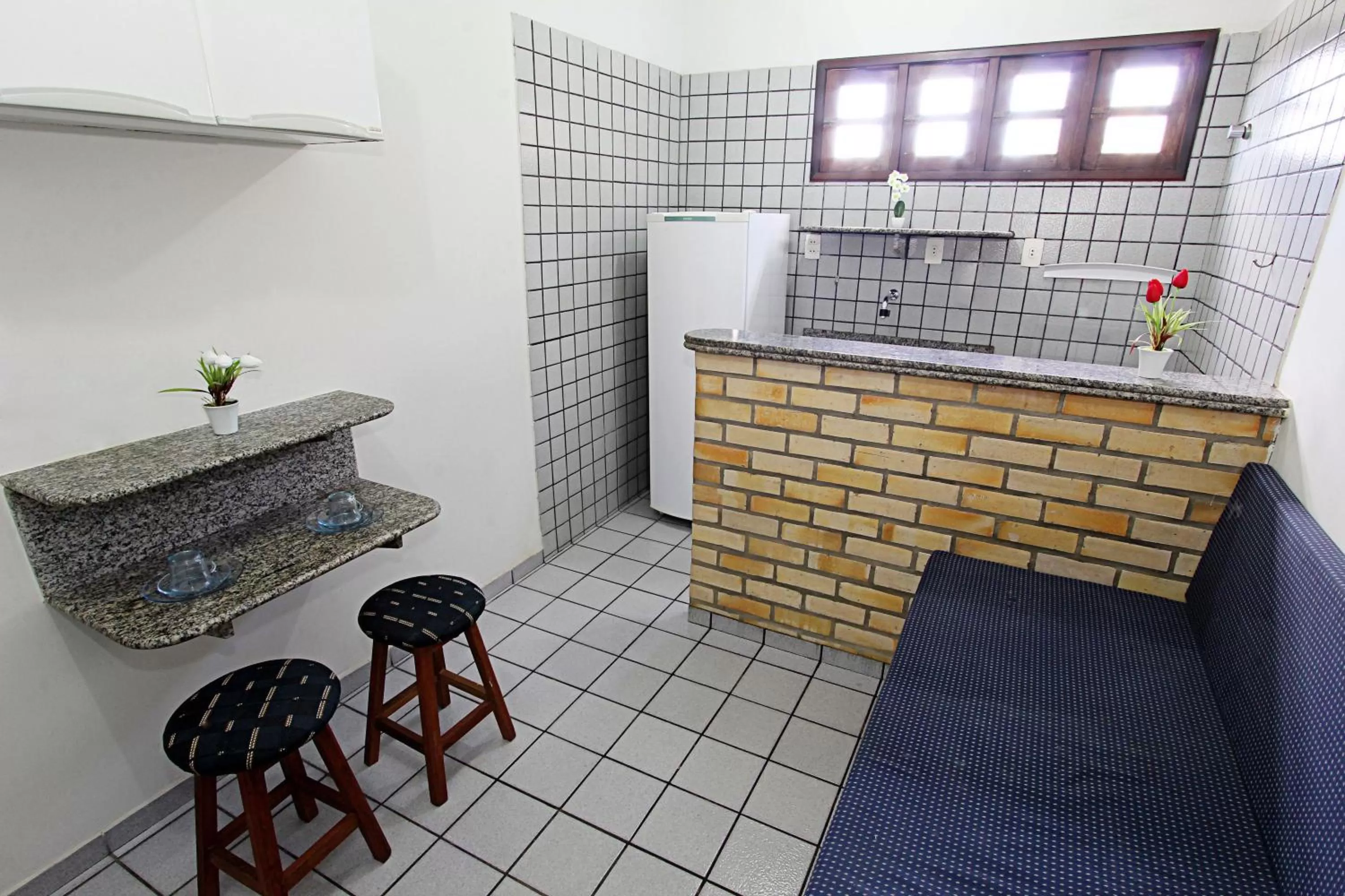 Kitchen or kitchenette in Praia Apart Hotel