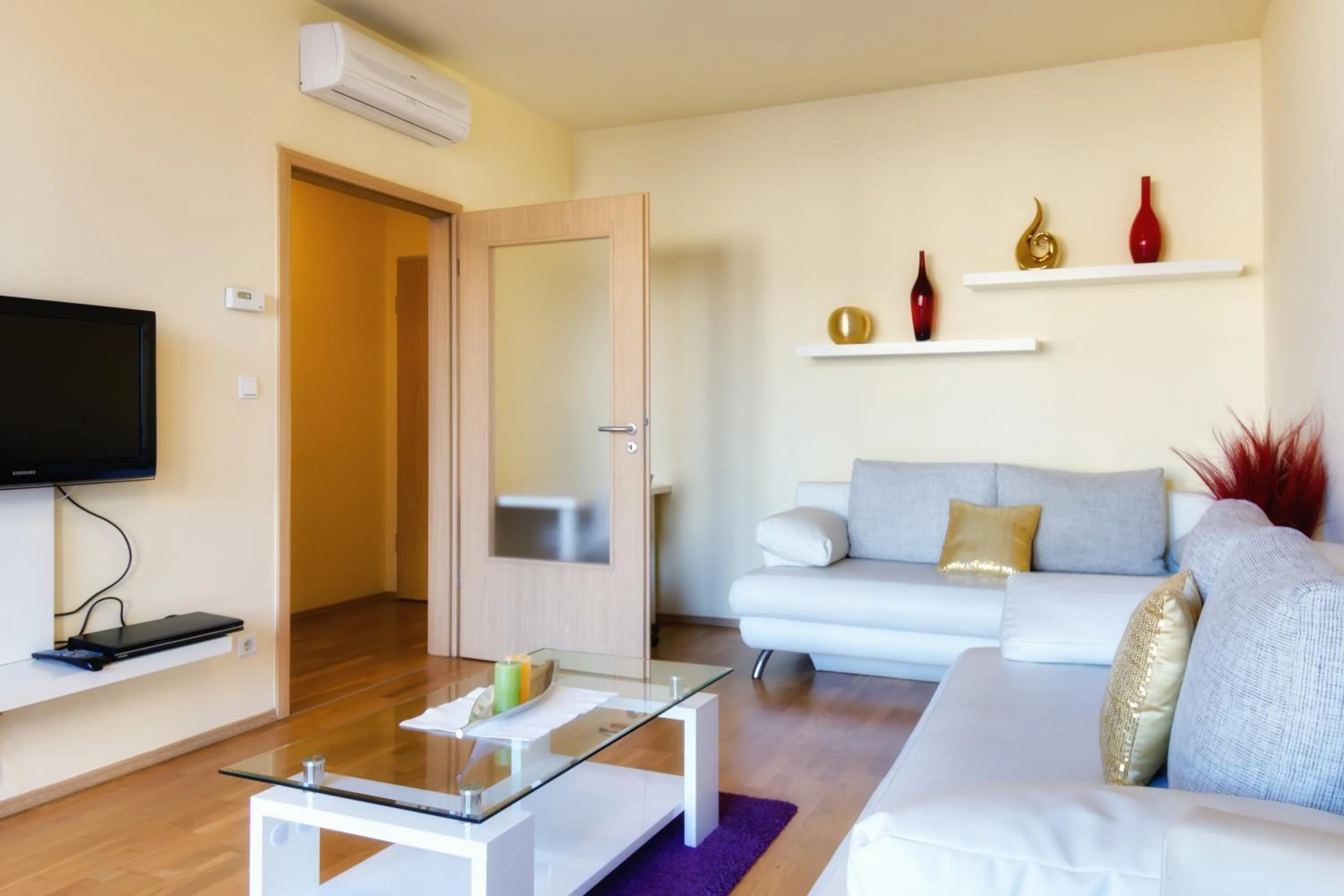 Living room in Trendy Deluxe Apartments