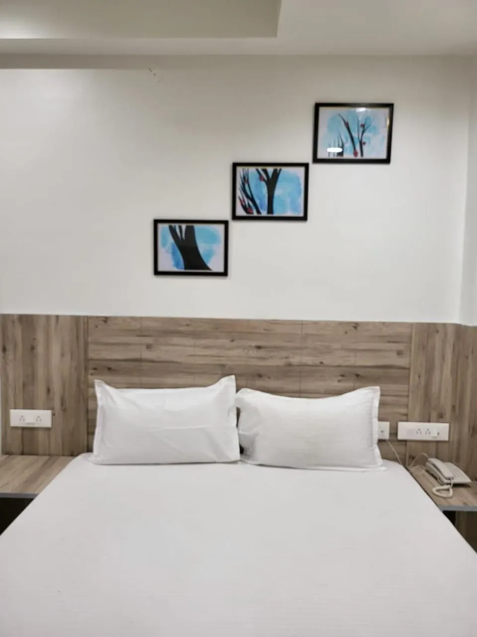 Bed in Hotel Jay Palace Inn