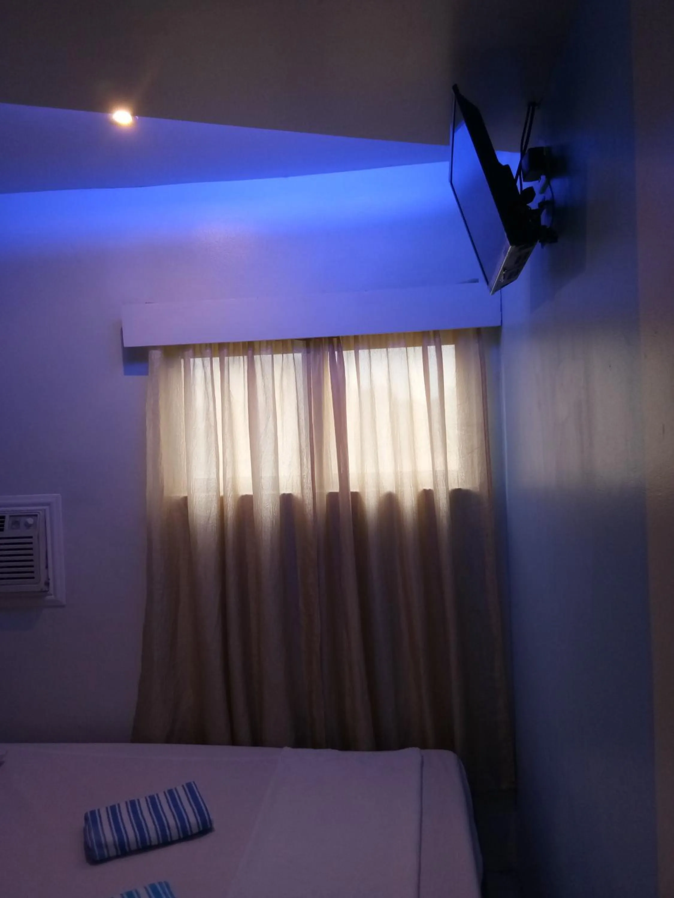 Bed in Anthurium Inn