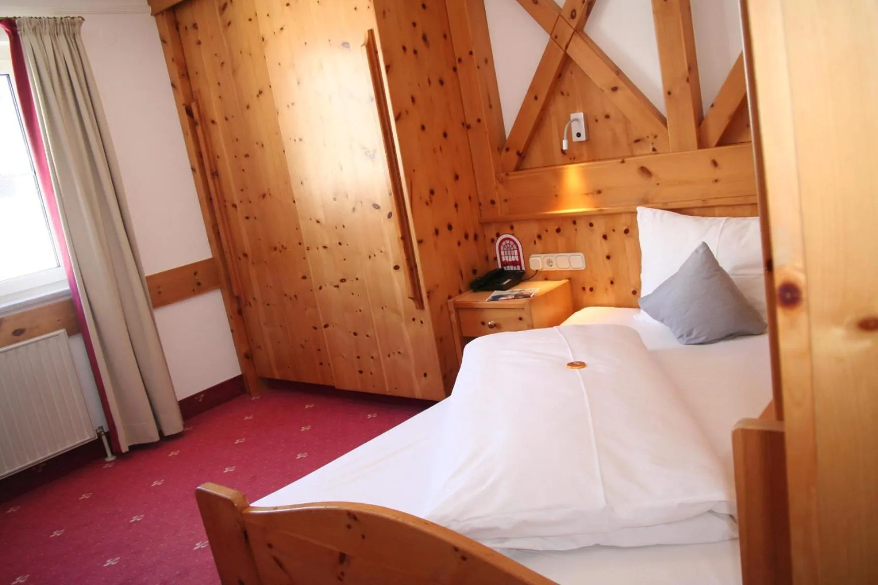 Photo of the whole room, Bed in JUFA Alpenhotel Saalbach