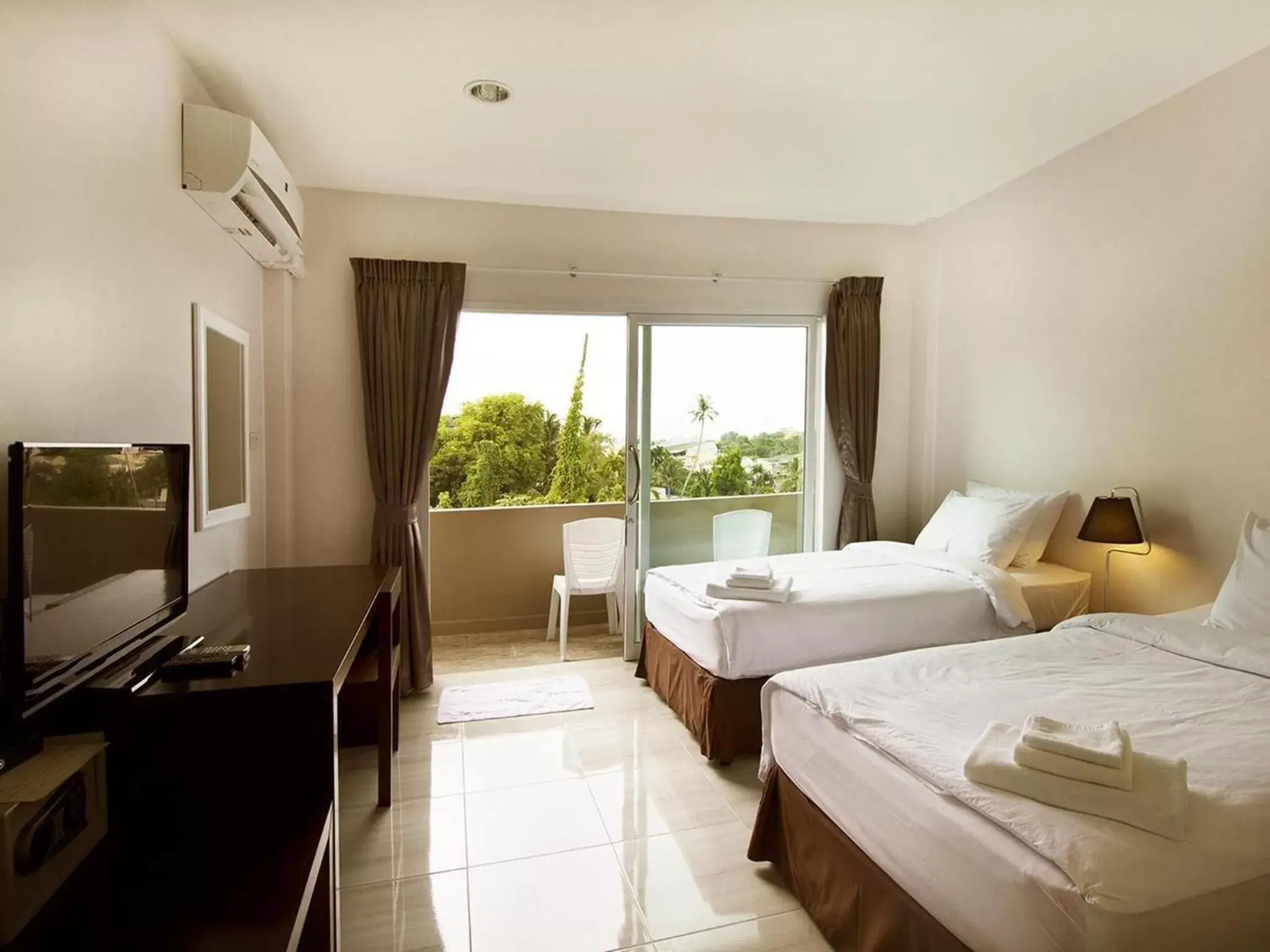 Comfort Twin Room with Balcony in The Farm House Hotel Ranong Comfort Twin Room with Balcony in The Farm House Hotel Ranong