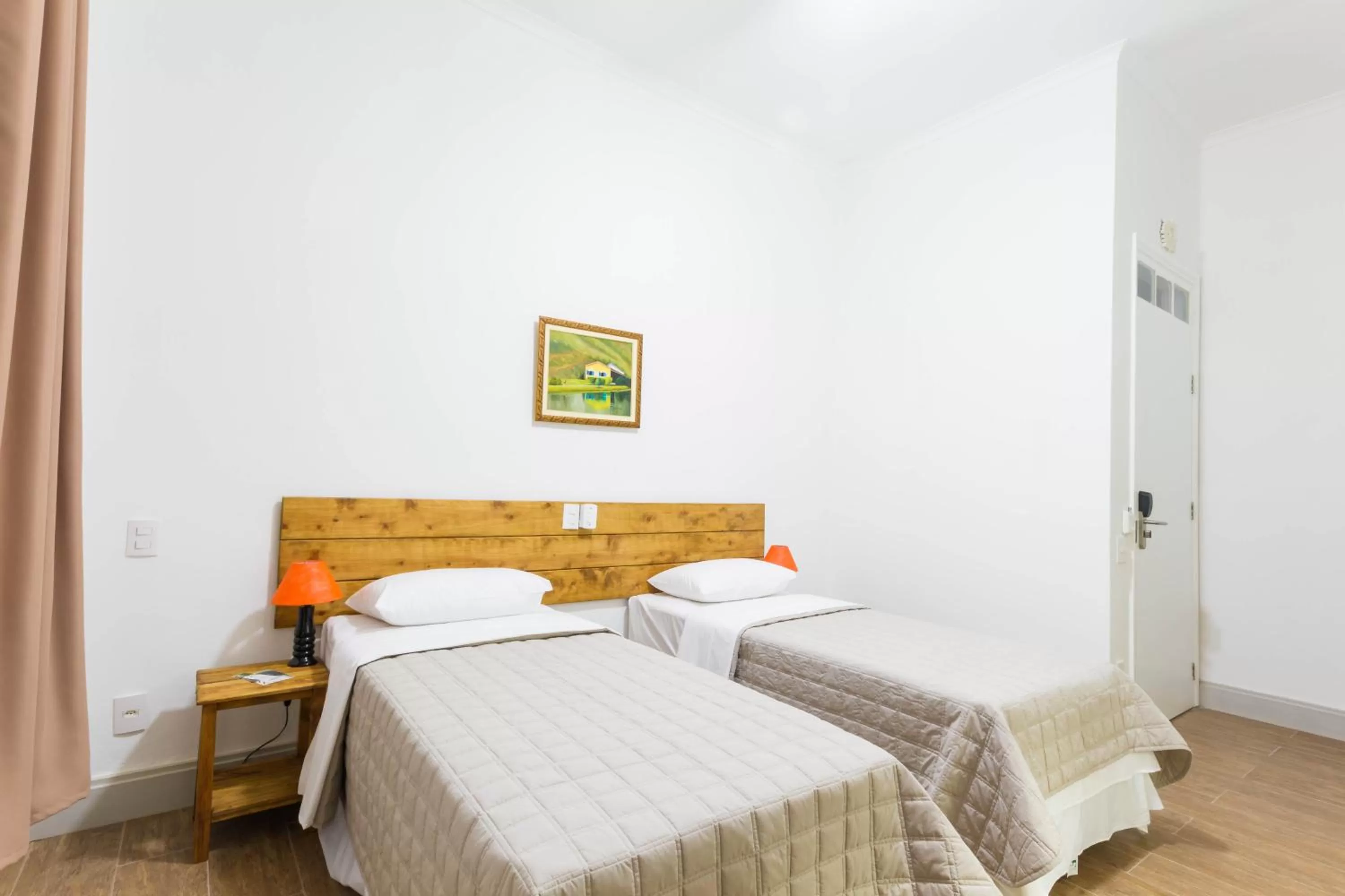 Bed in Pousada Sagrados Corações