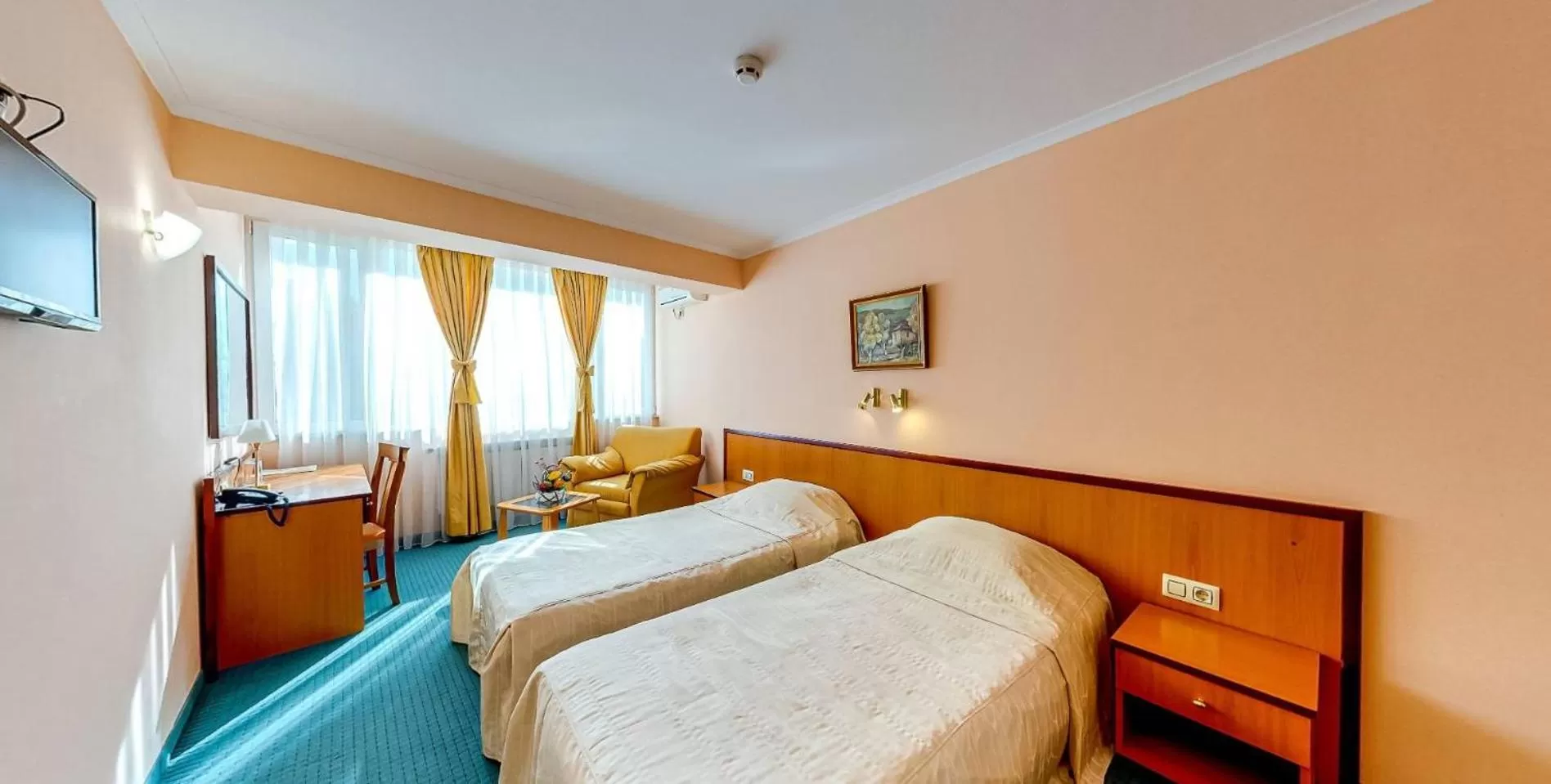 Bed in Troyan Plaza Hotel