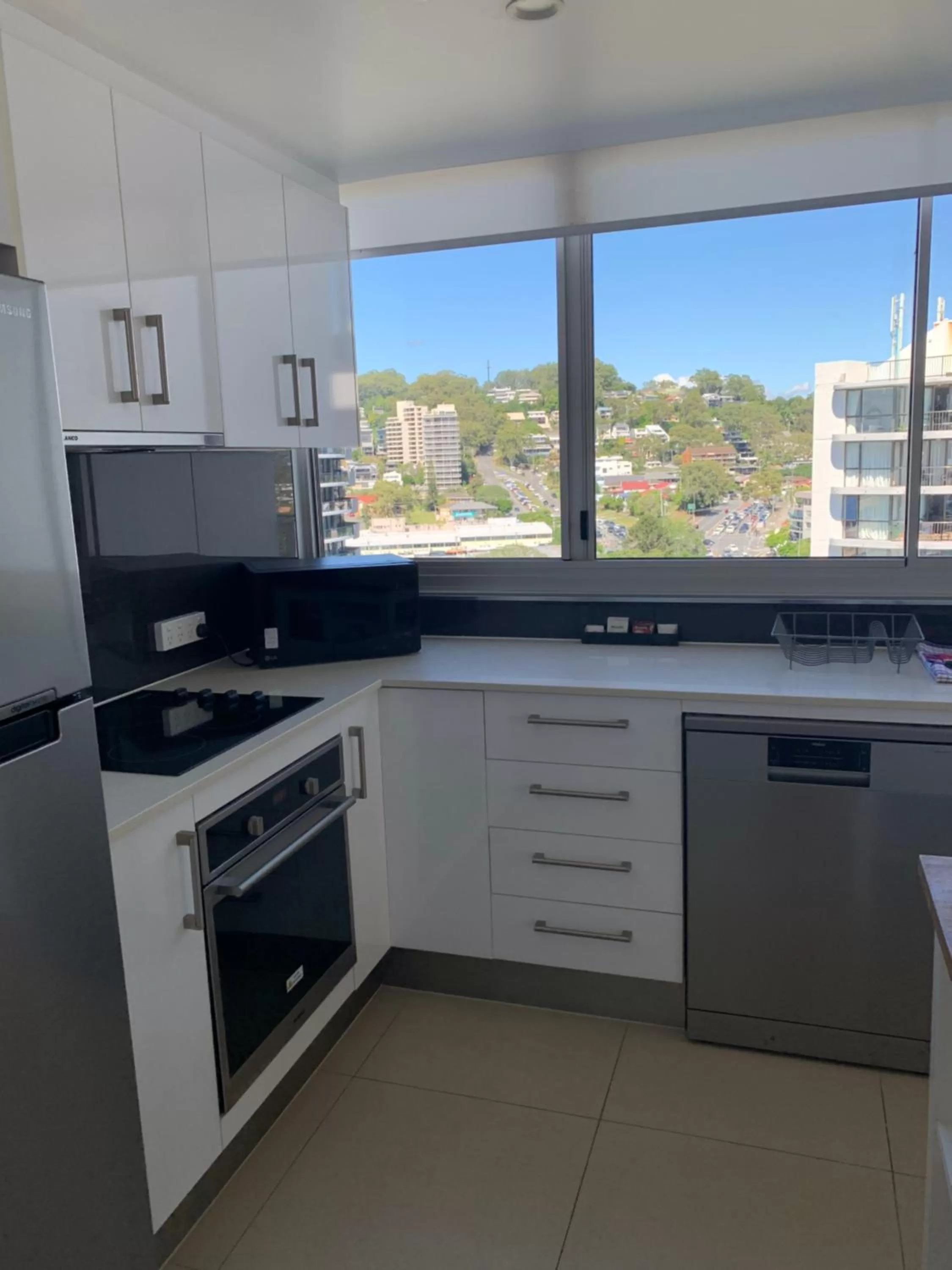 Kitchen or kitchenette in Pacific Regis Beachfront Holiday Apartments