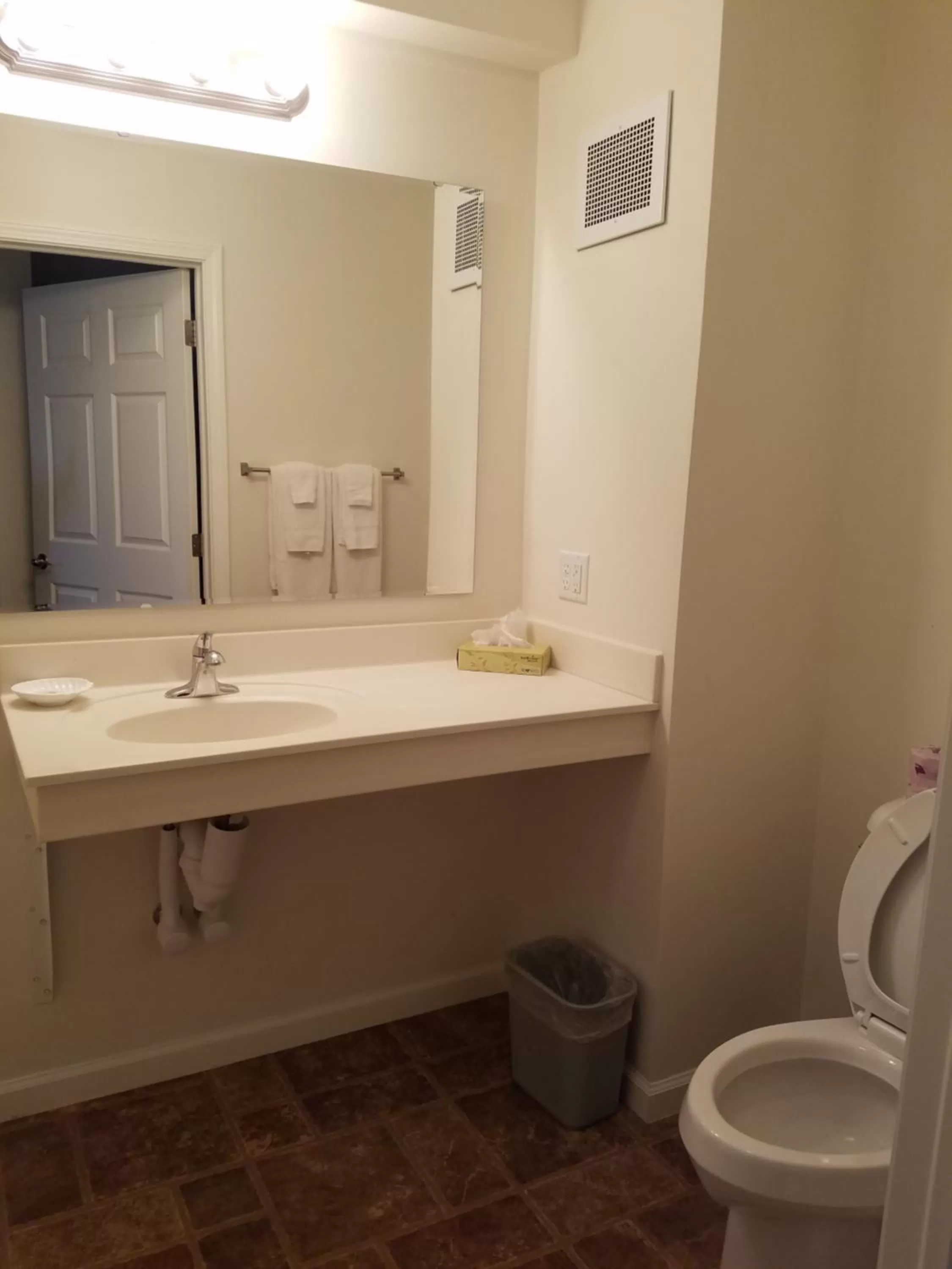 Bathroom in Ramada by Wyndham Williston