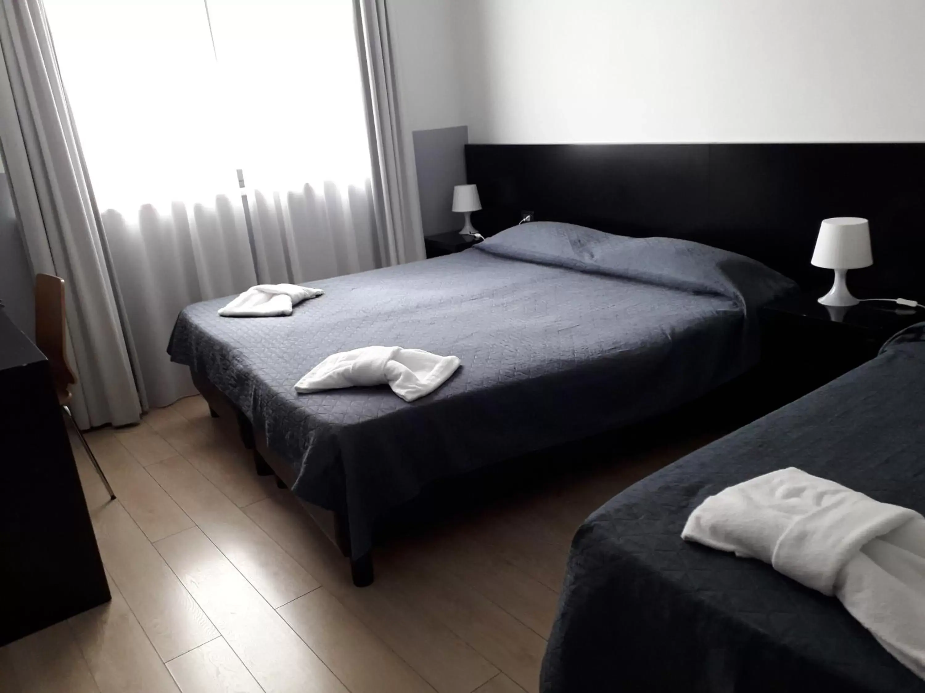 Triple Room in Hotel Aniene Triple Room in Hotel Aniene