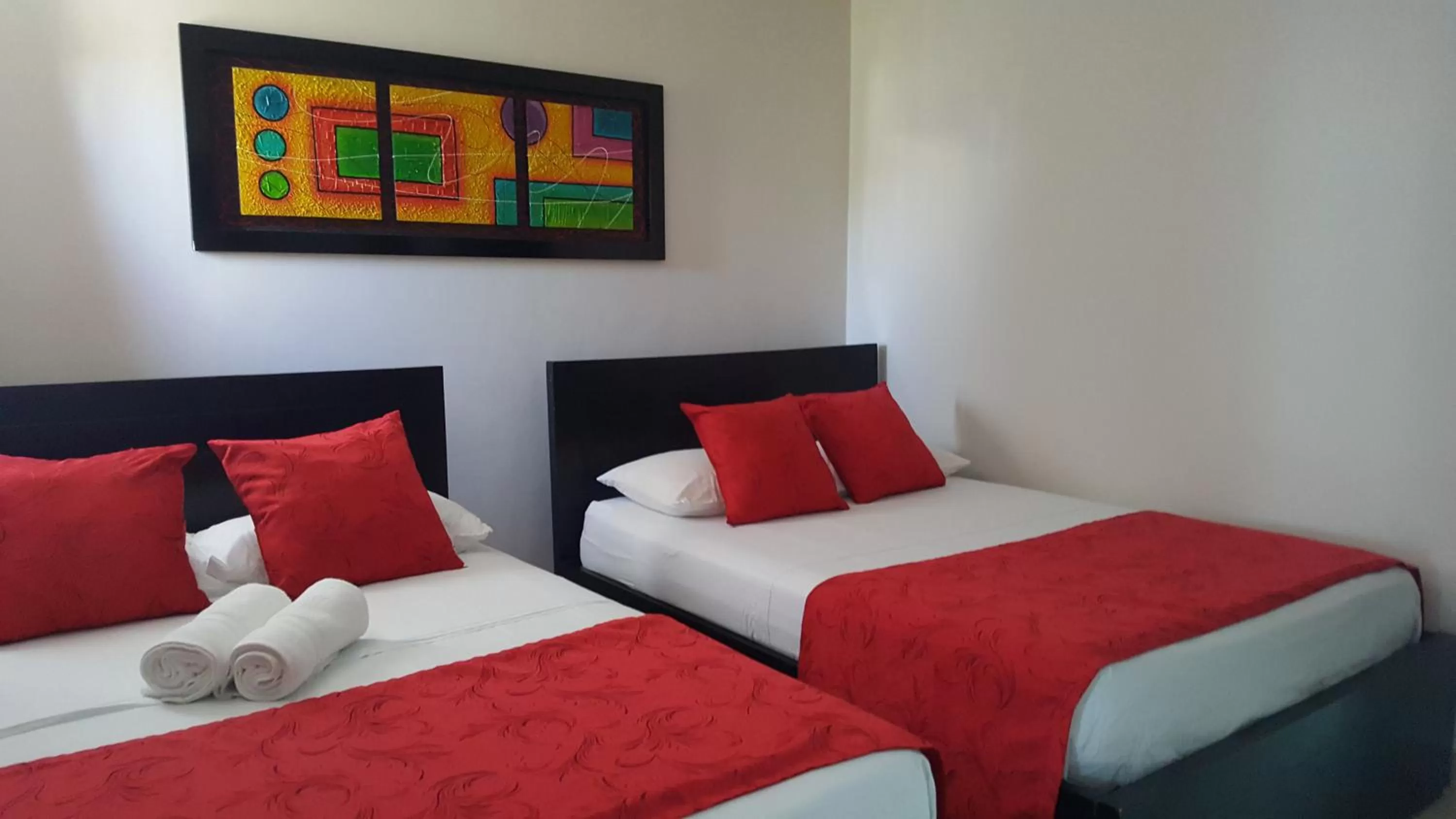 Bed in Caribbean Island Hotel Piso 2