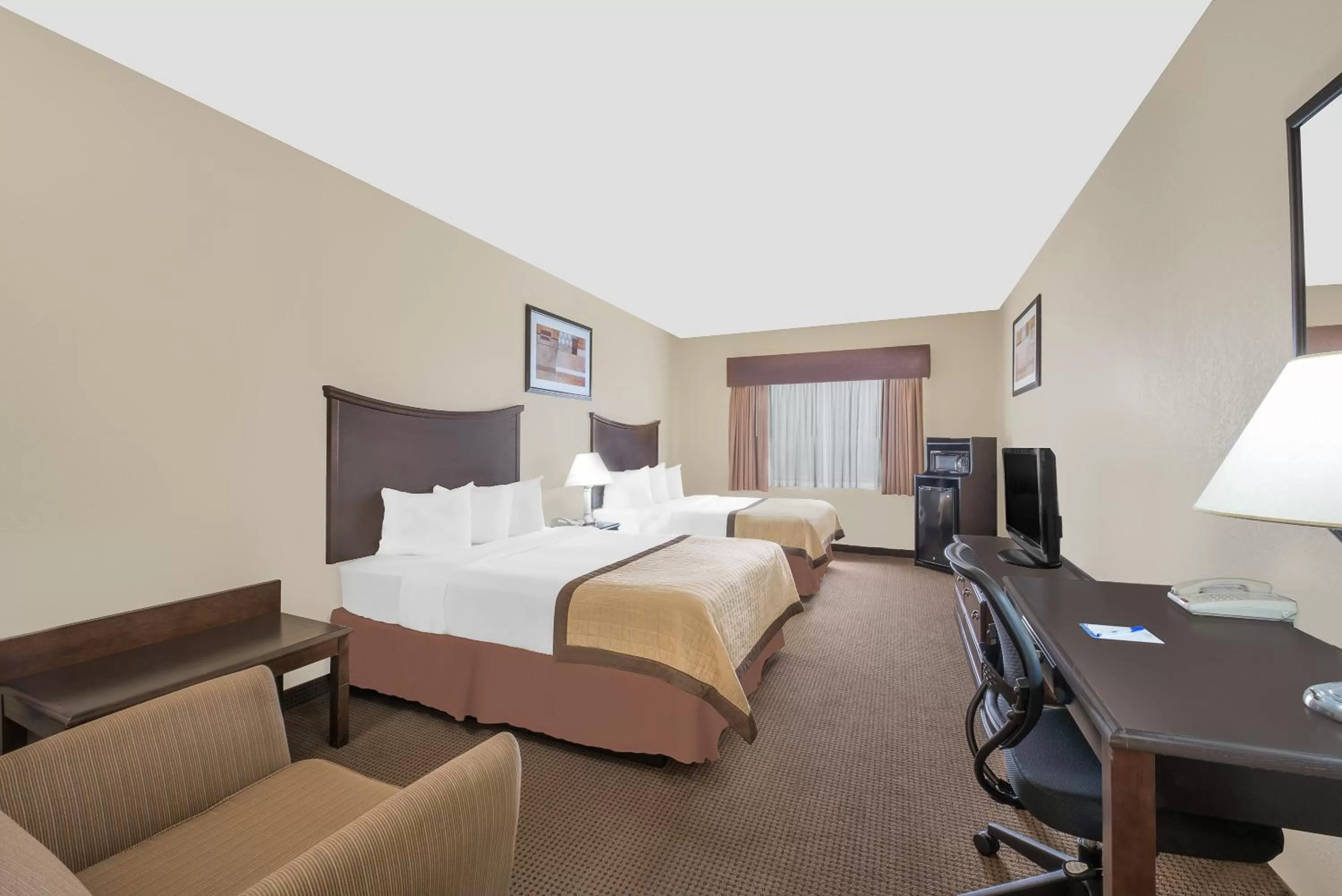 Bed in Baymont by Wyndham Snyder