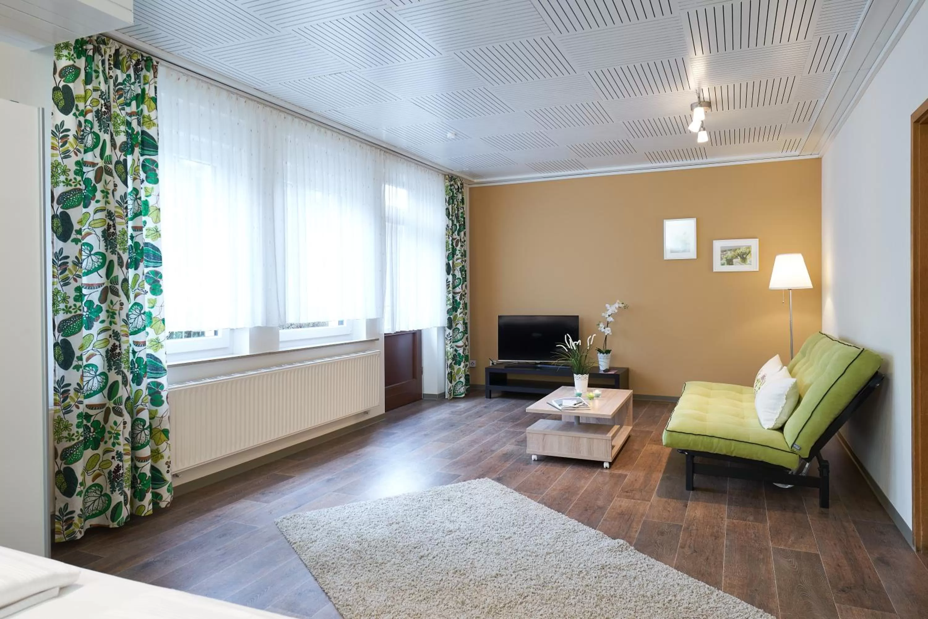 Seating area, Bed in Landhotel Karrenberg