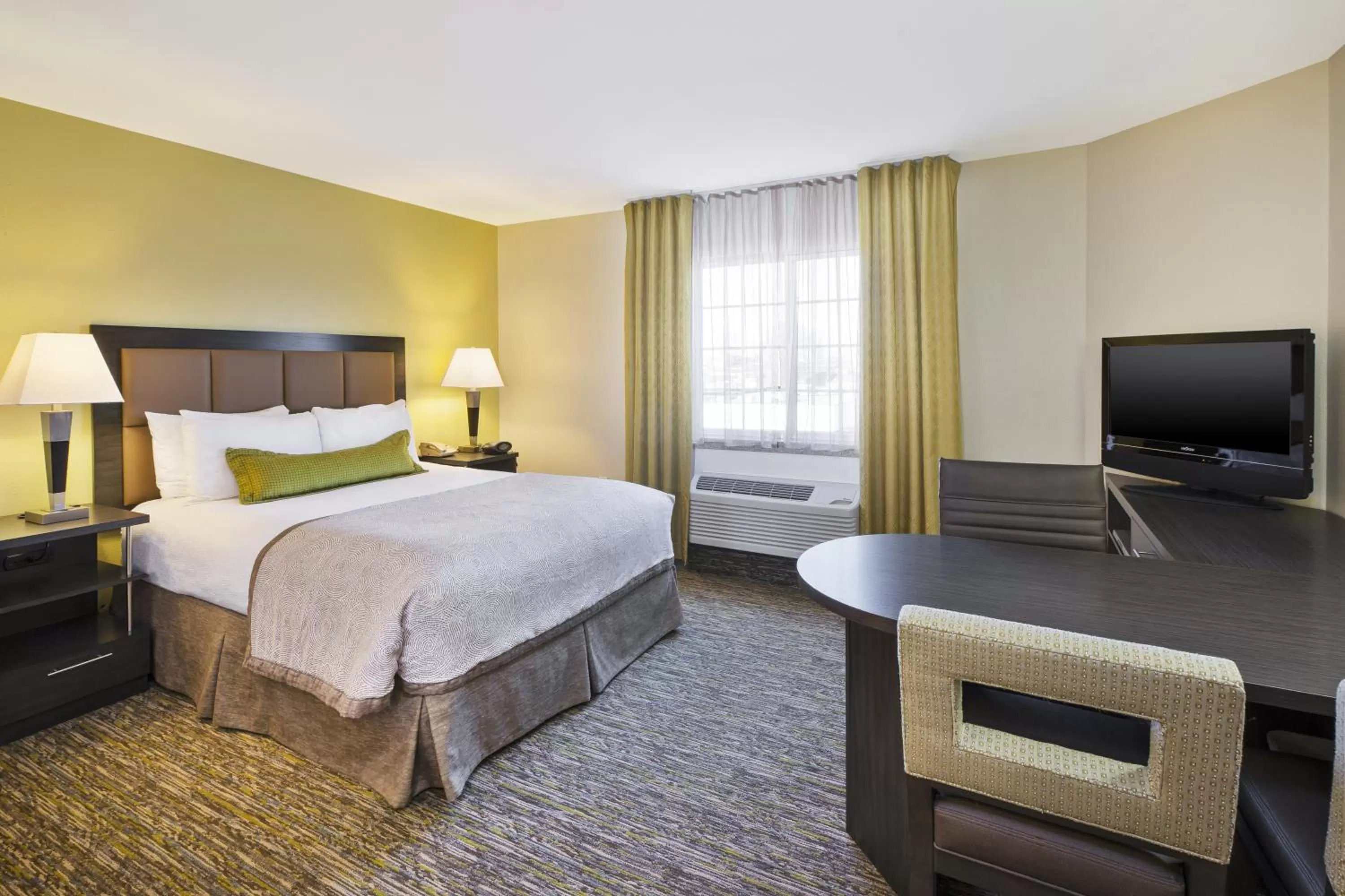Photo of the whole room, Bed in Candlewood Suites Indianapolis Airport by IHG
