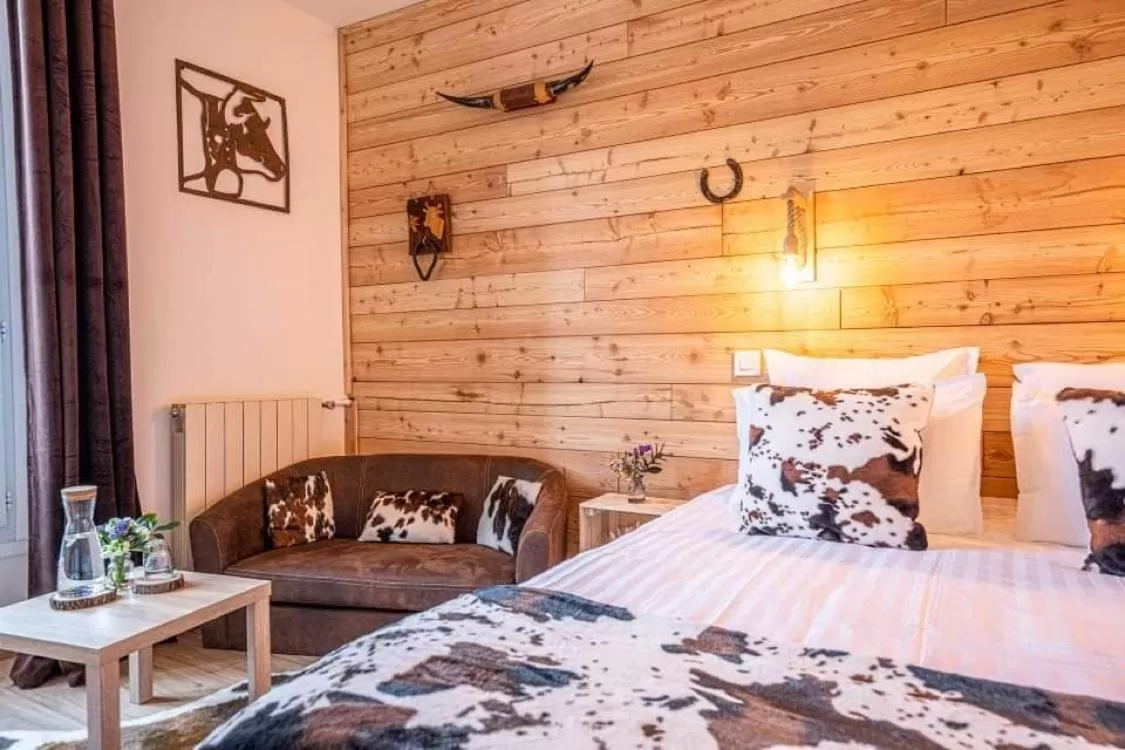 Bed in Hotel La Bonne Auberge