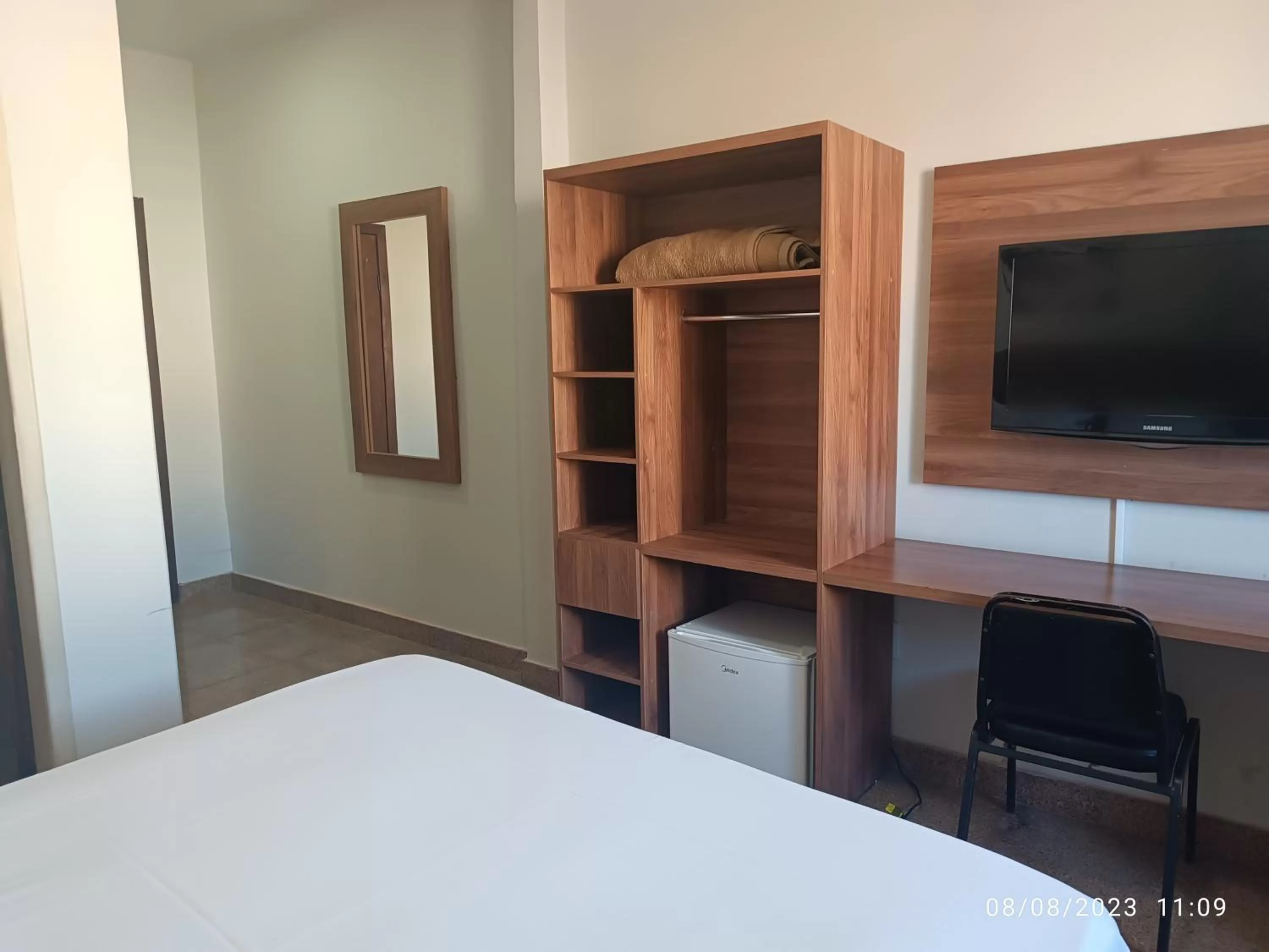 TV/Entertainment Center in Hotel Oscar Blue Montes Claros