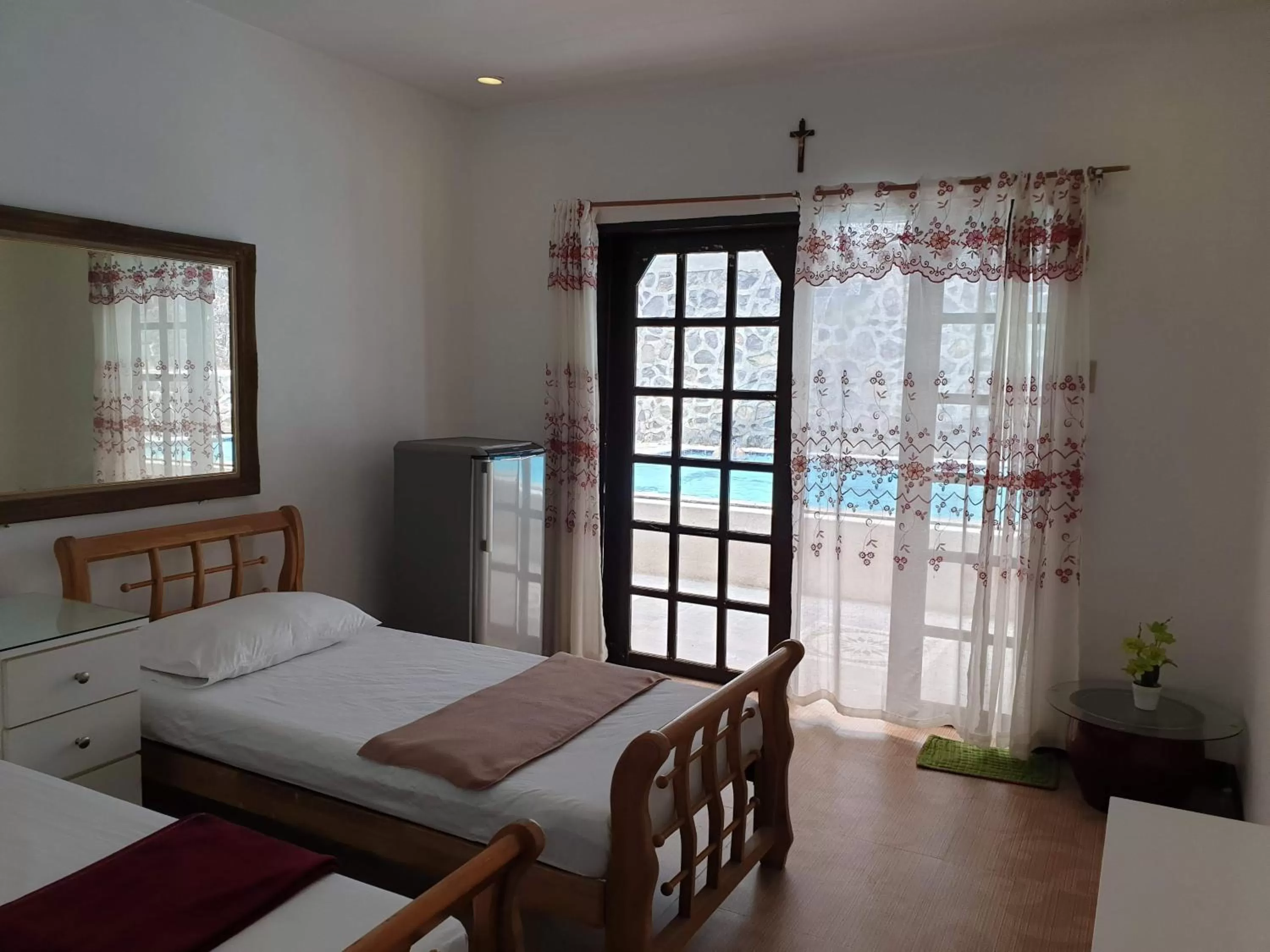 Bed in Raya Del Sol Dive Resort