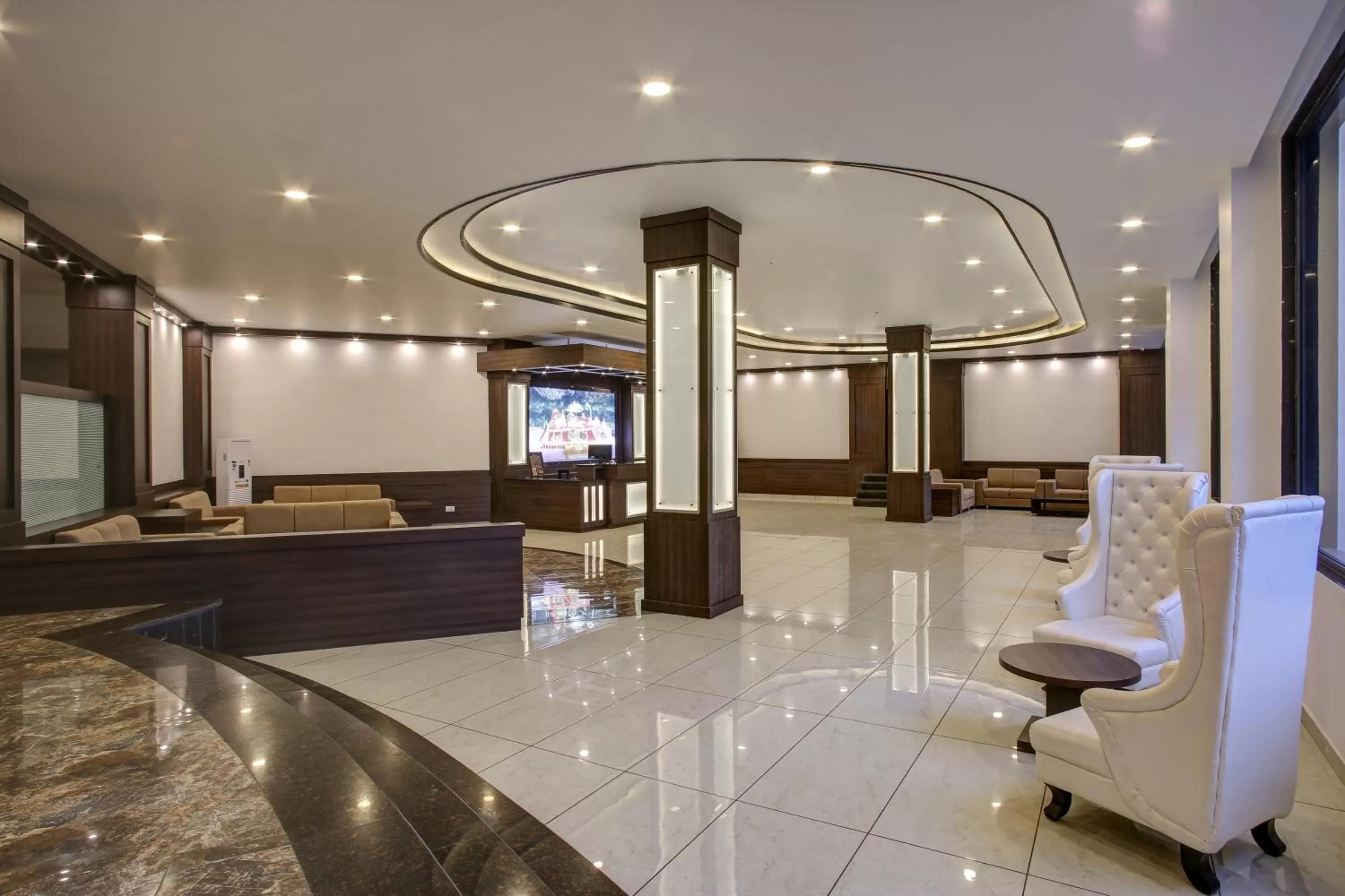 Lobby or reception in Hotel The Royal Krishna