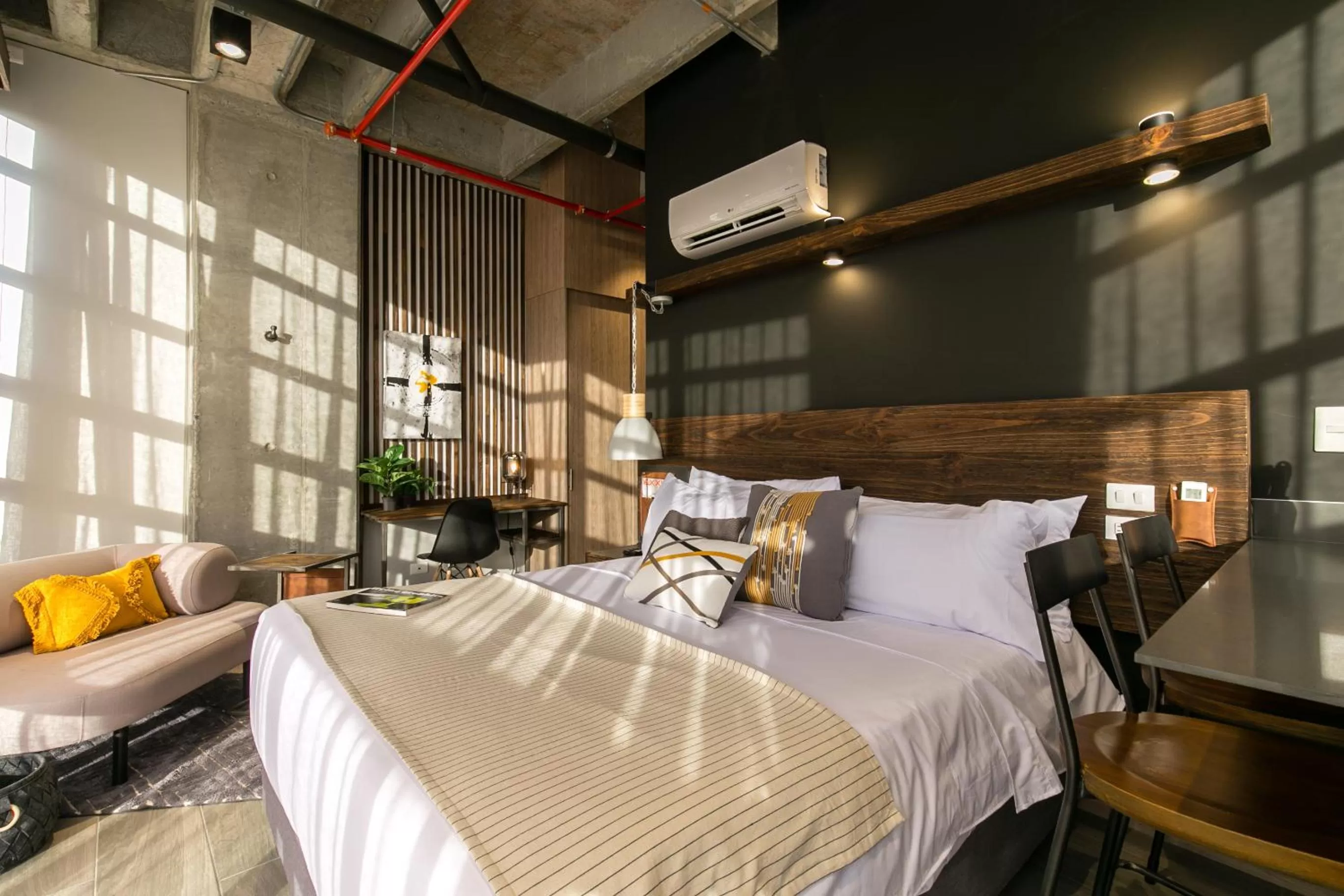 Bed in Factory Lofts Hotel