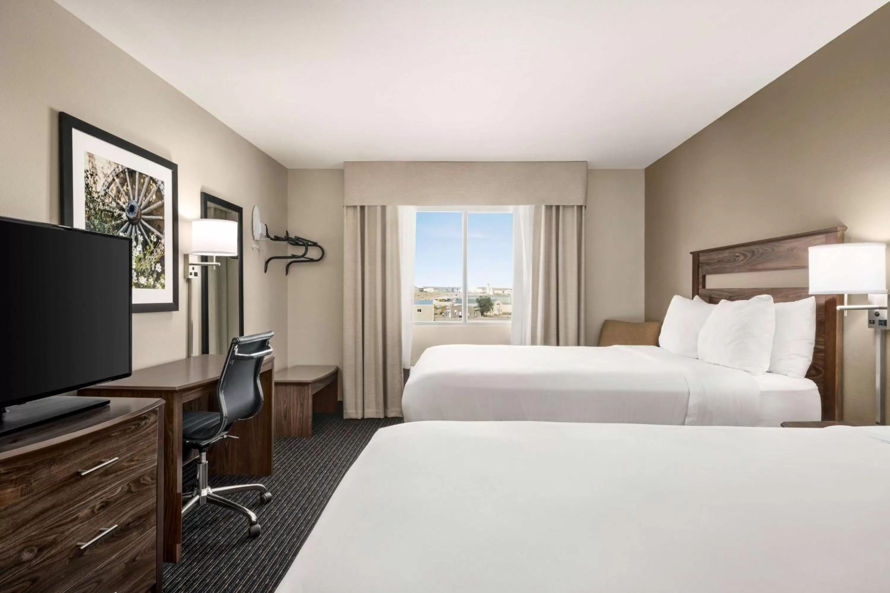 Photo of the whole room, Bed in Baymont by Wyndham Rawlins