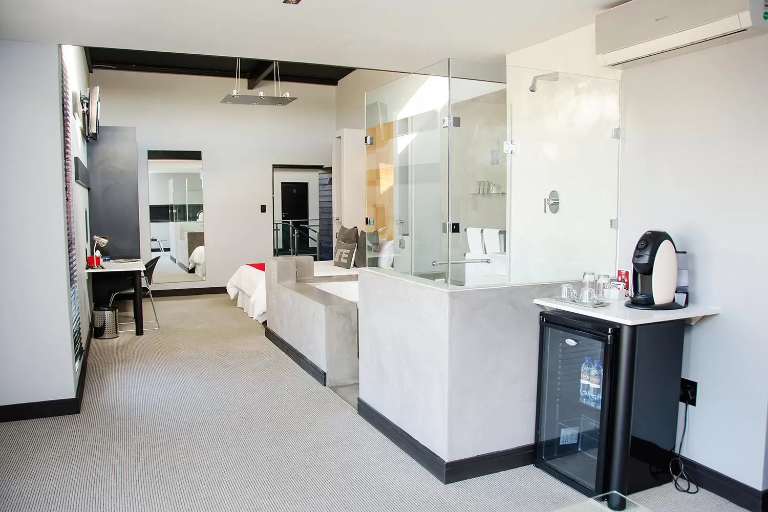 Bedroom in City Living Boutique Hotel