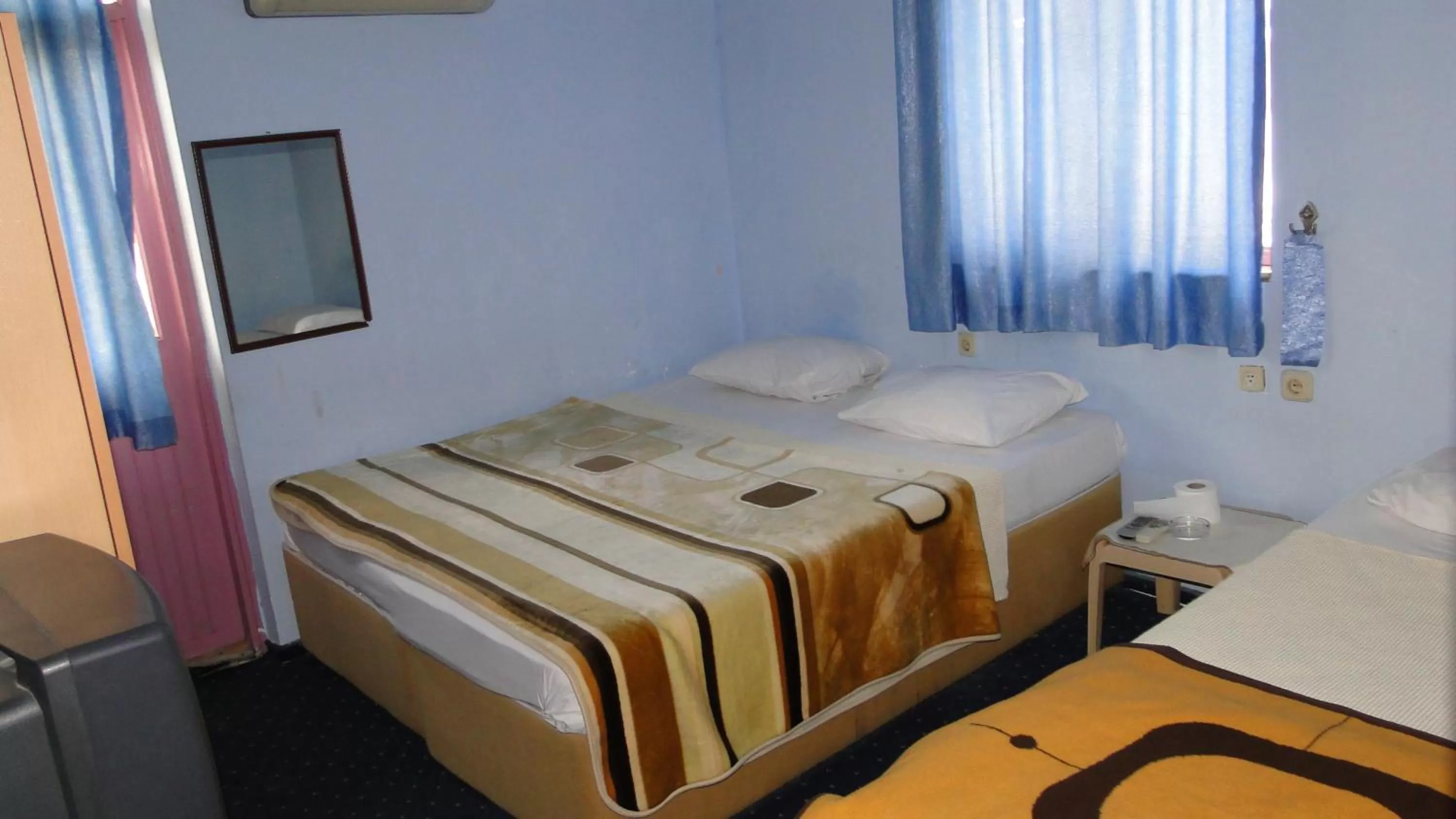 Bed in Sunrise Hotel
