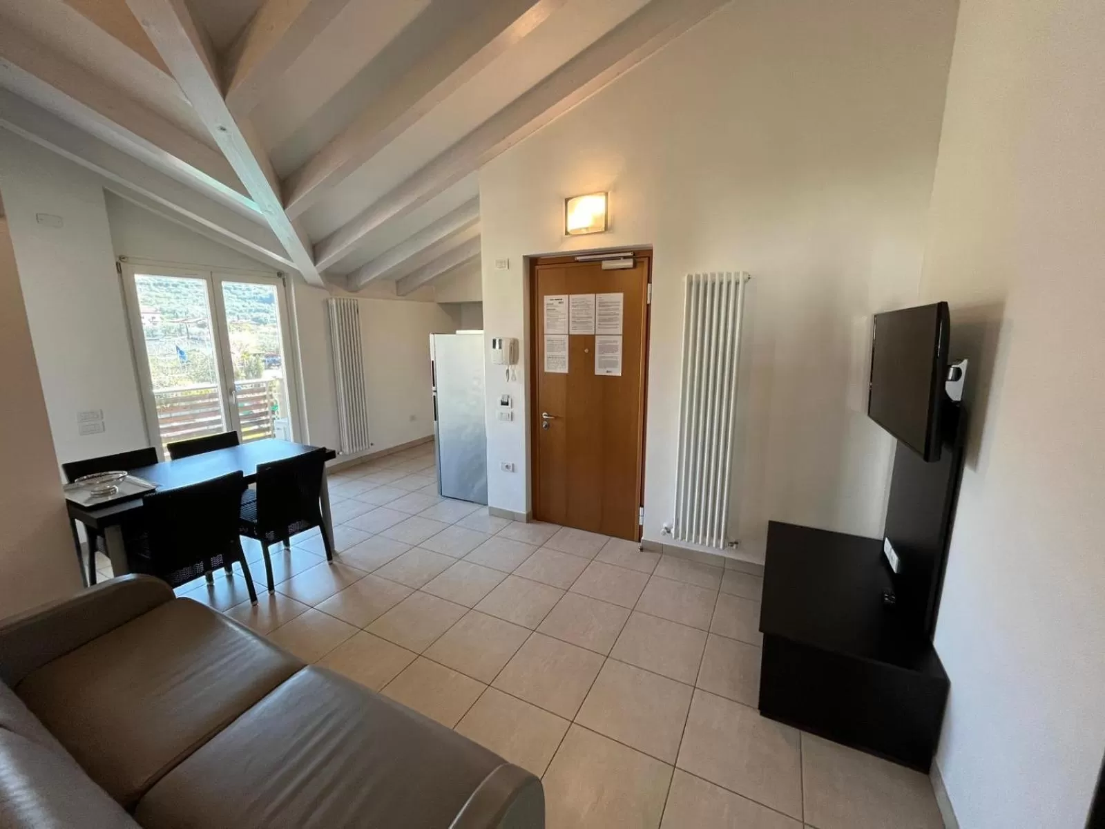 Communal lounge/ TV room in 4 Limoni Apartment Resort