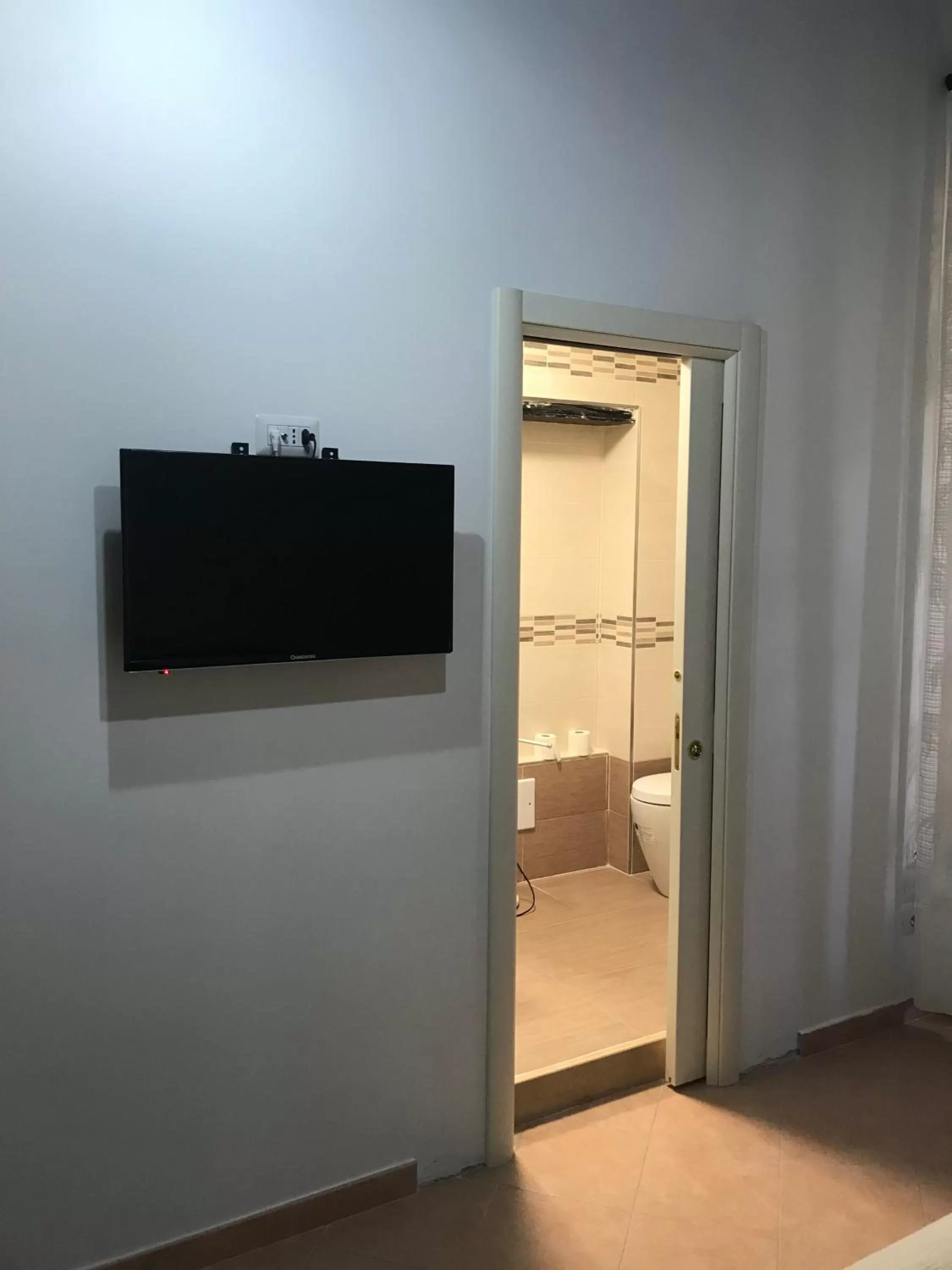 Bathroom, TV/Entertainment Center in B&B Pozzo dei Desideri