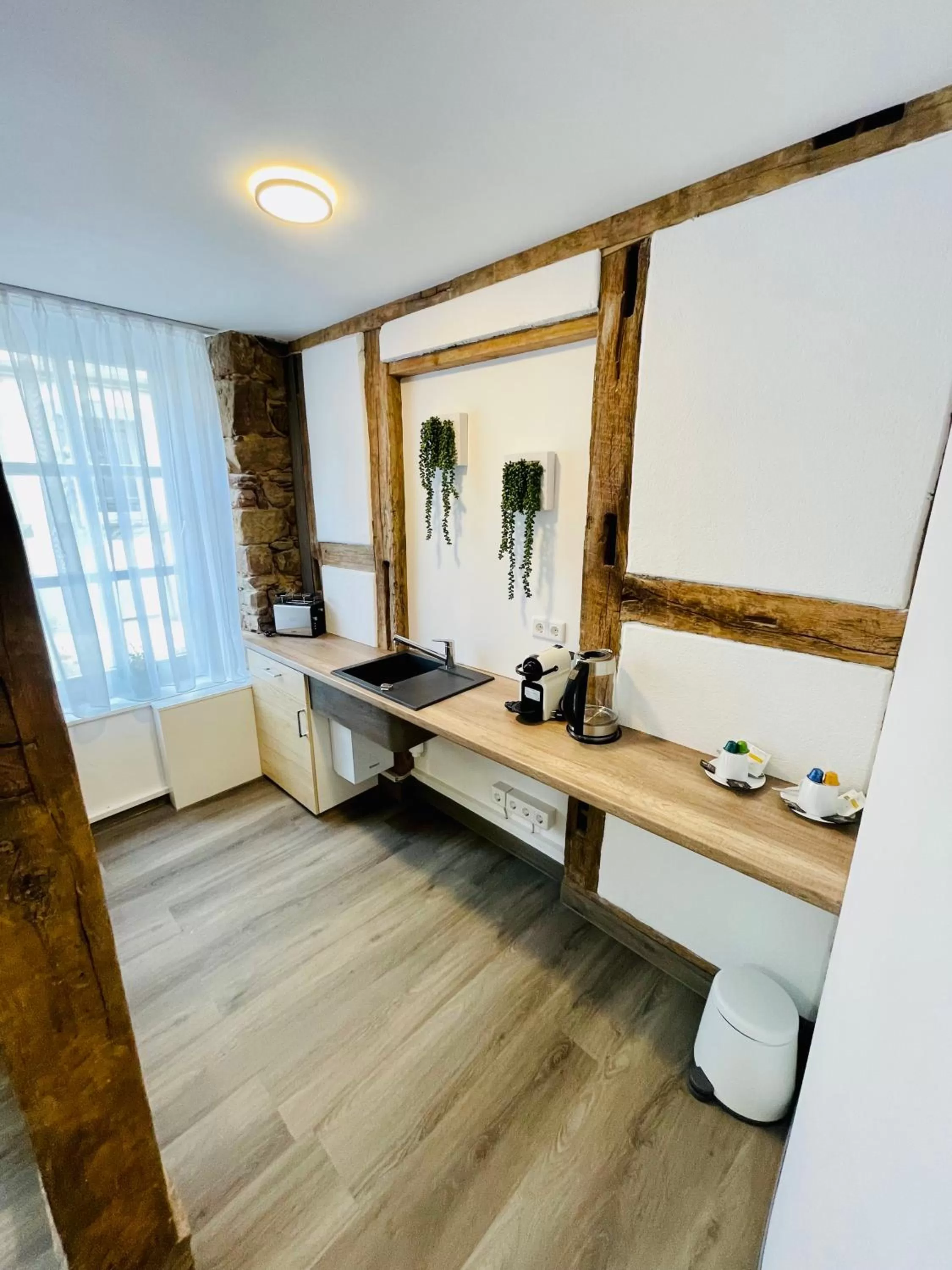 Kitchen or kitchenette in Hotel am Schloss