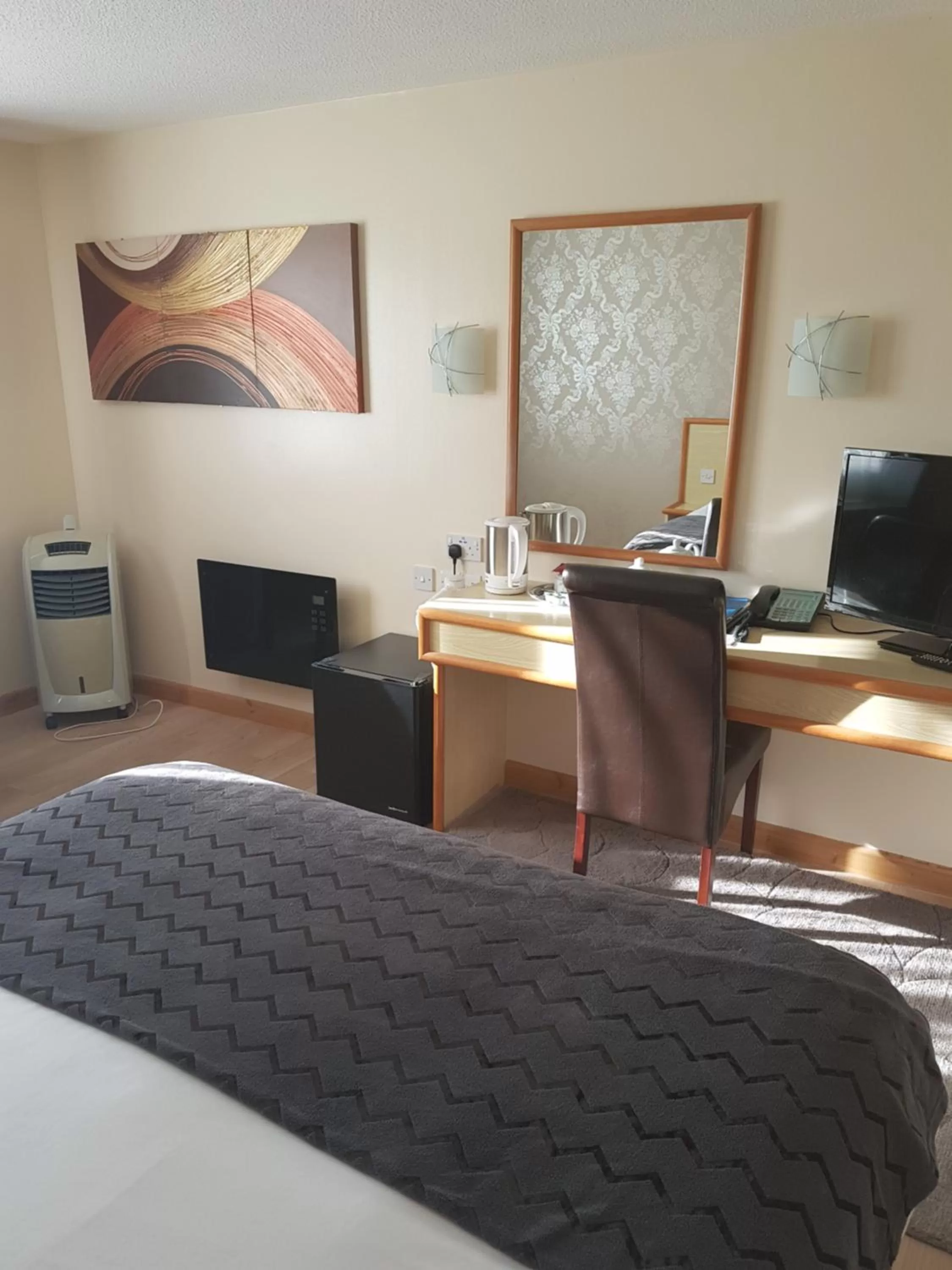 Bed in Travel Plaza Hotel