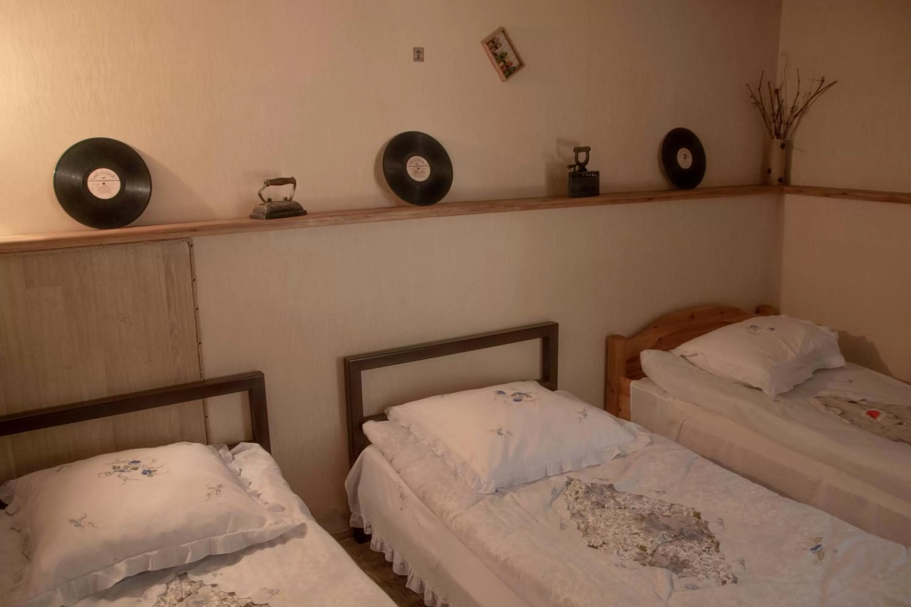 Bed in Qilimcha's Guesthouse