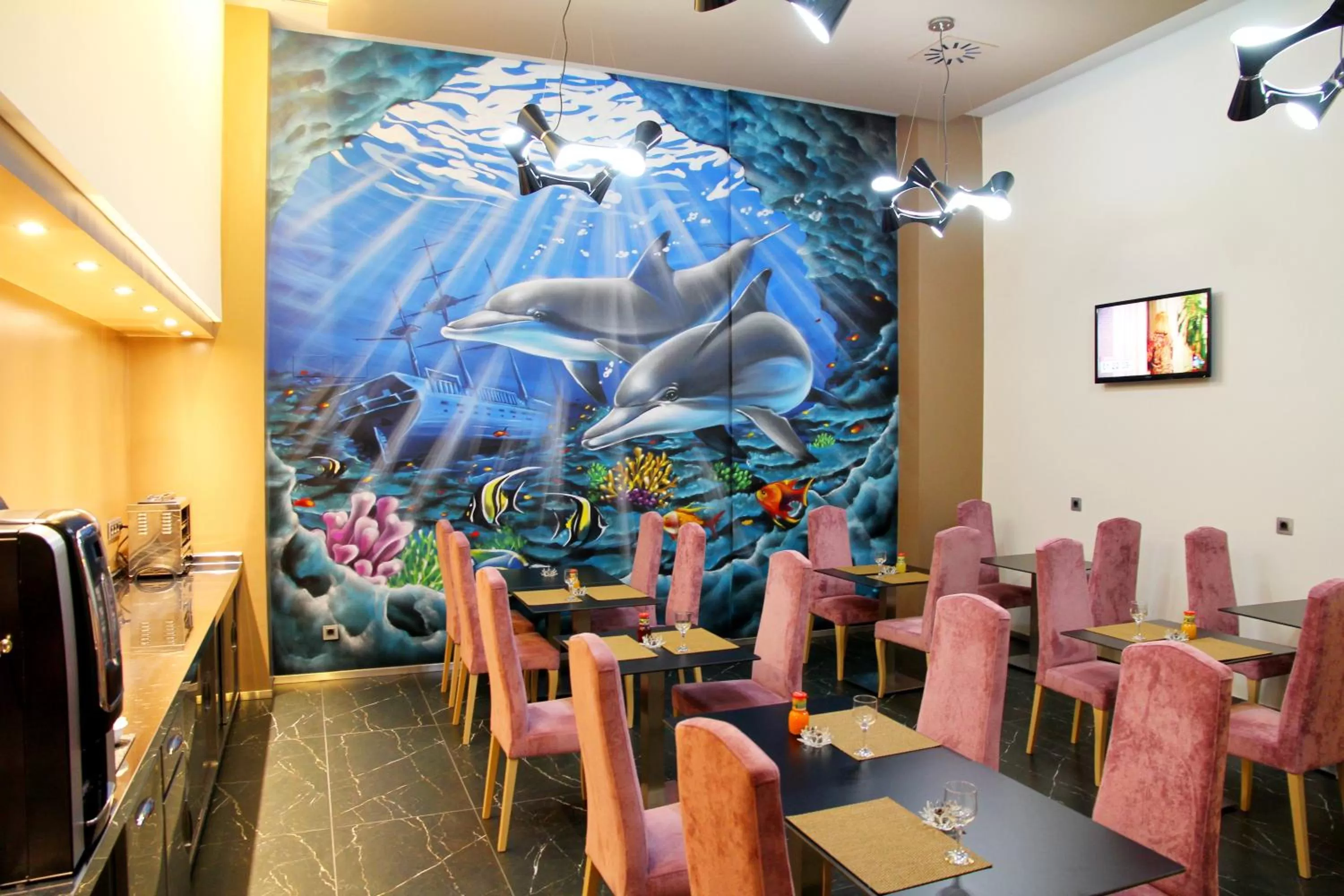 Communal lounge/ TV room in Agua de Mar Hotel Boutique