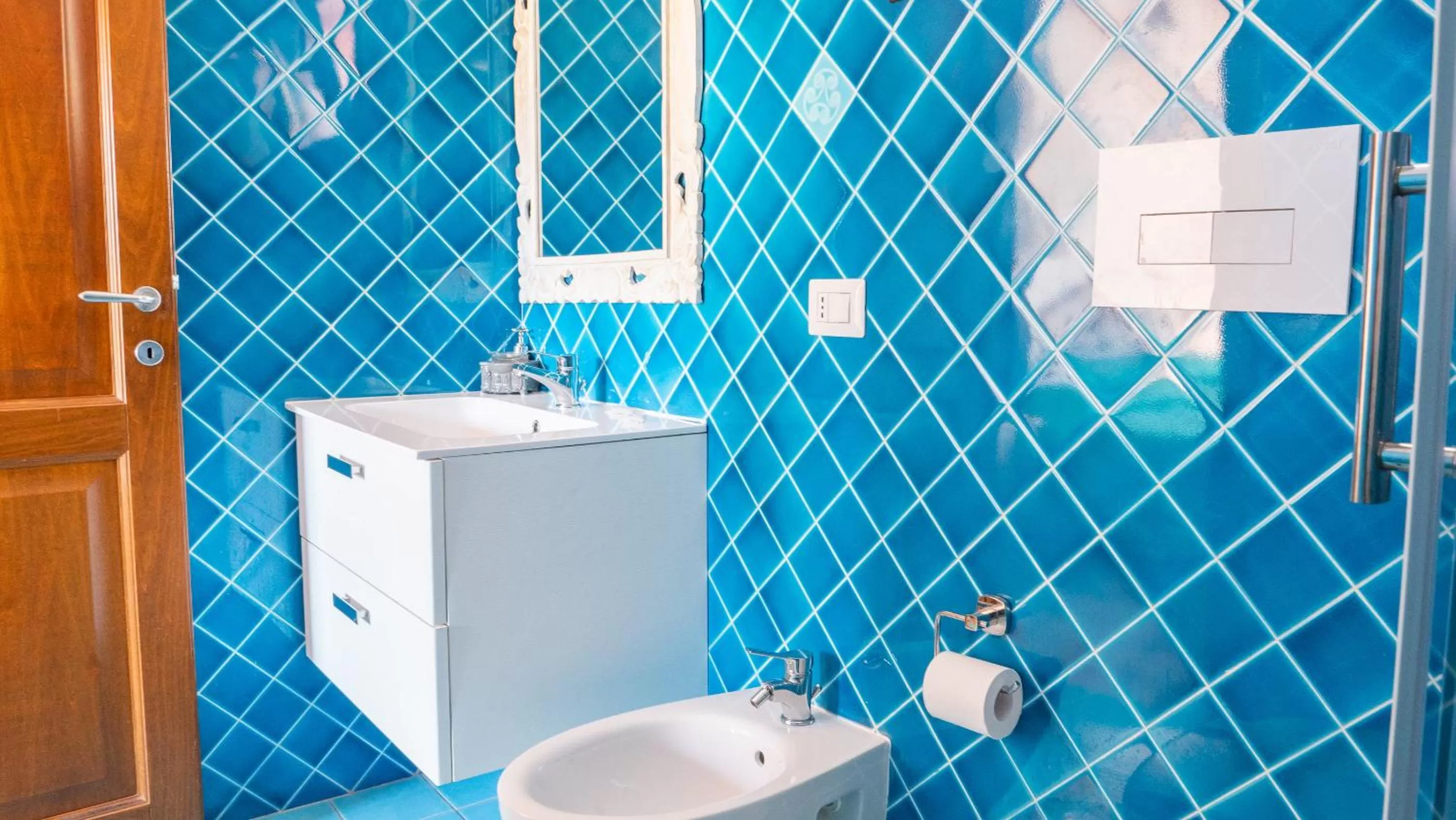 Bathroom in QUADRIFOGLIO Affittacamere