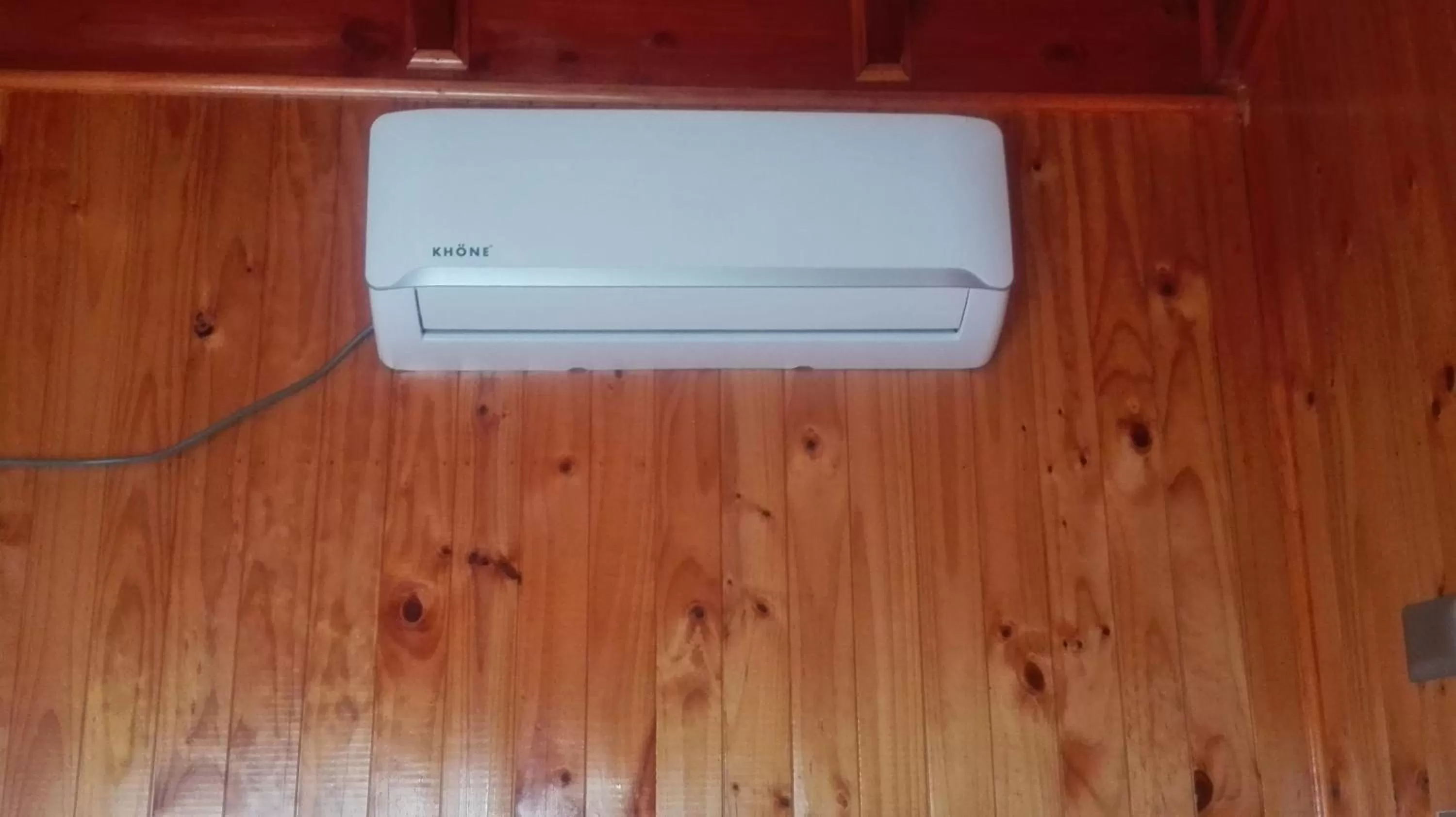 Photo of the whole room, TV/Entertainment Center in Apart-Hotel Colonia-Königsberg ESTACIONAMIENTO Deptos Completos Ubicado En El Centro De Valdivia AIRE ACONDICIONADO