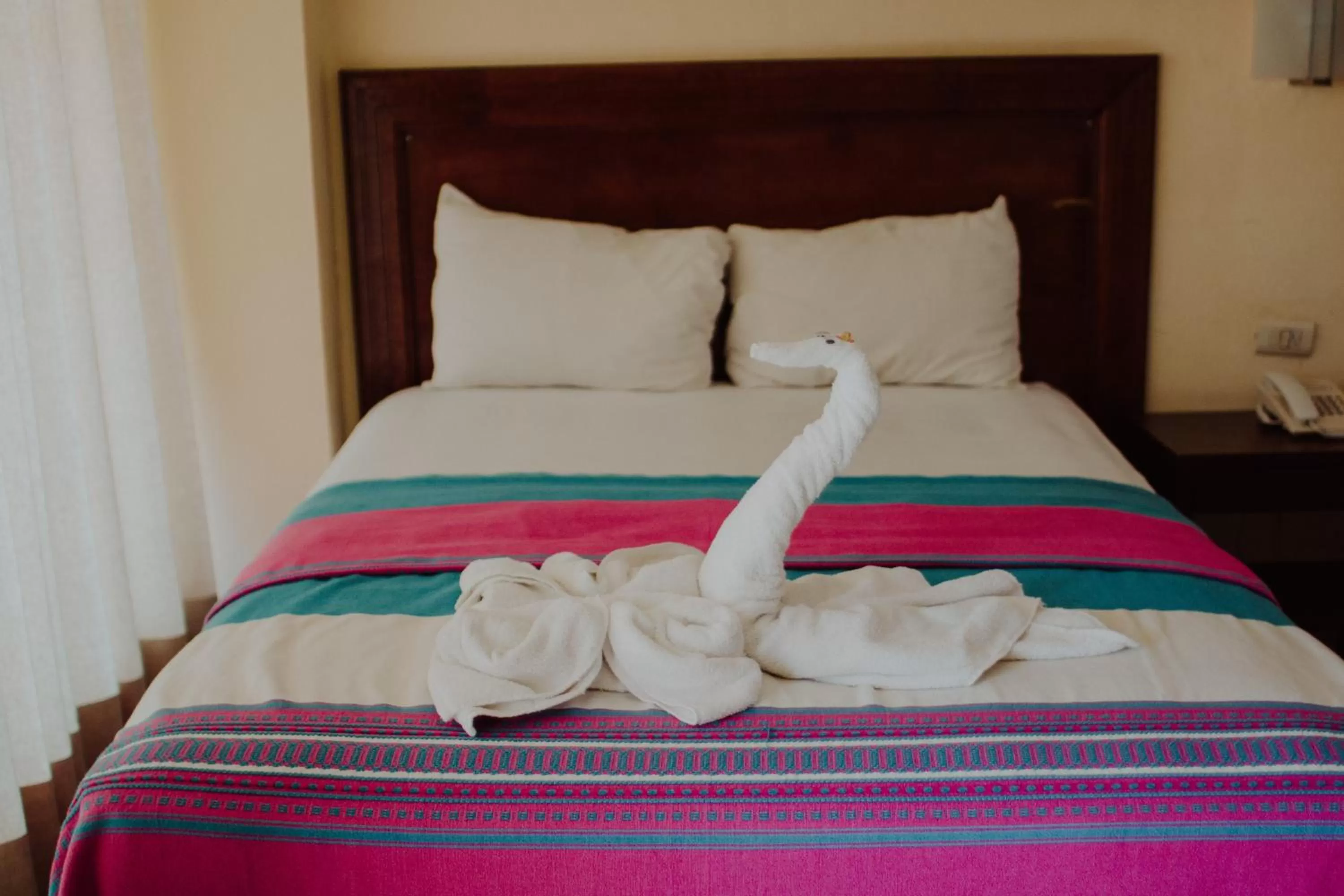 Bed in Hotel Ambassador Mérida