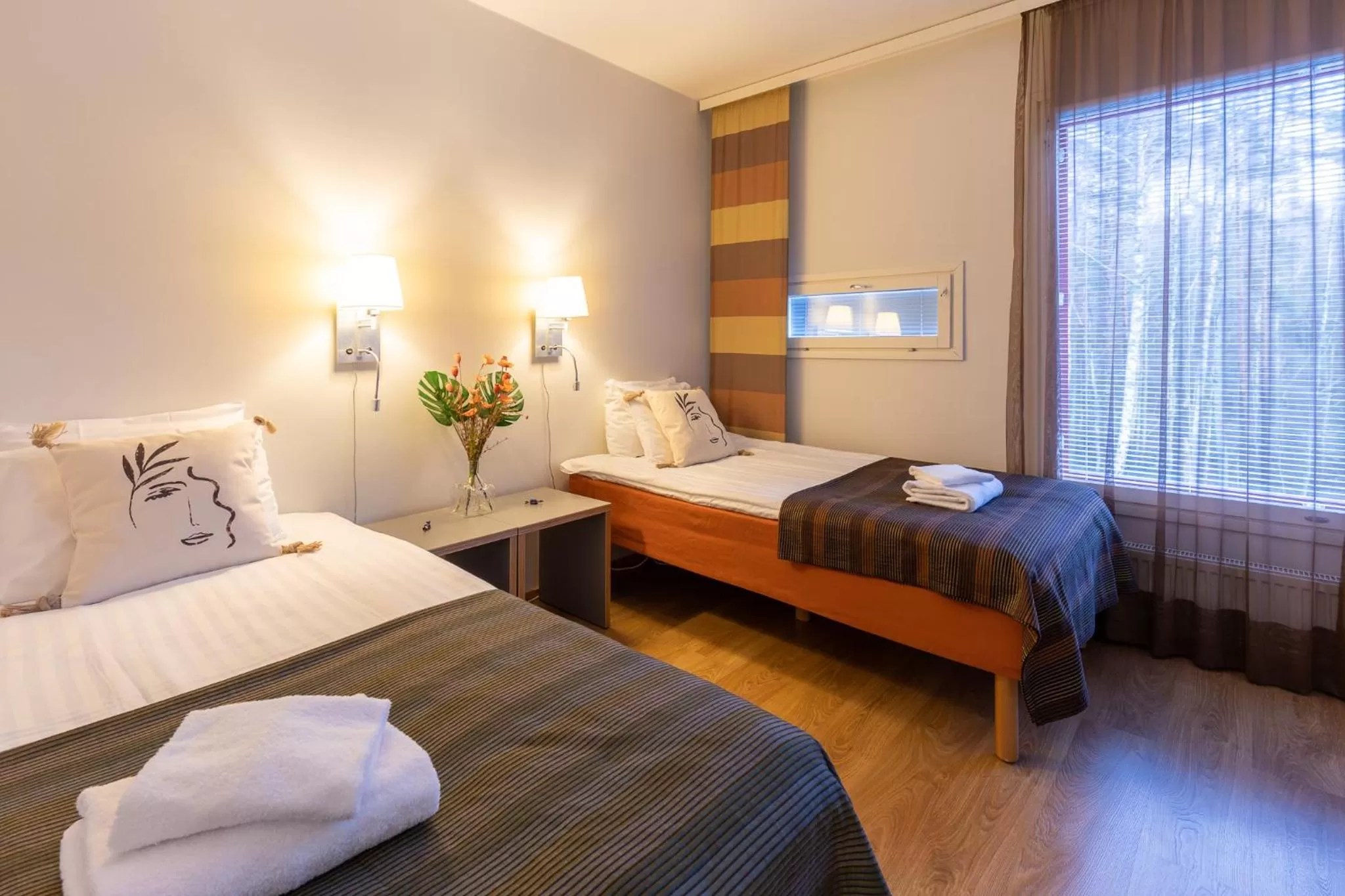 Bed in Hotel Linnasmäki