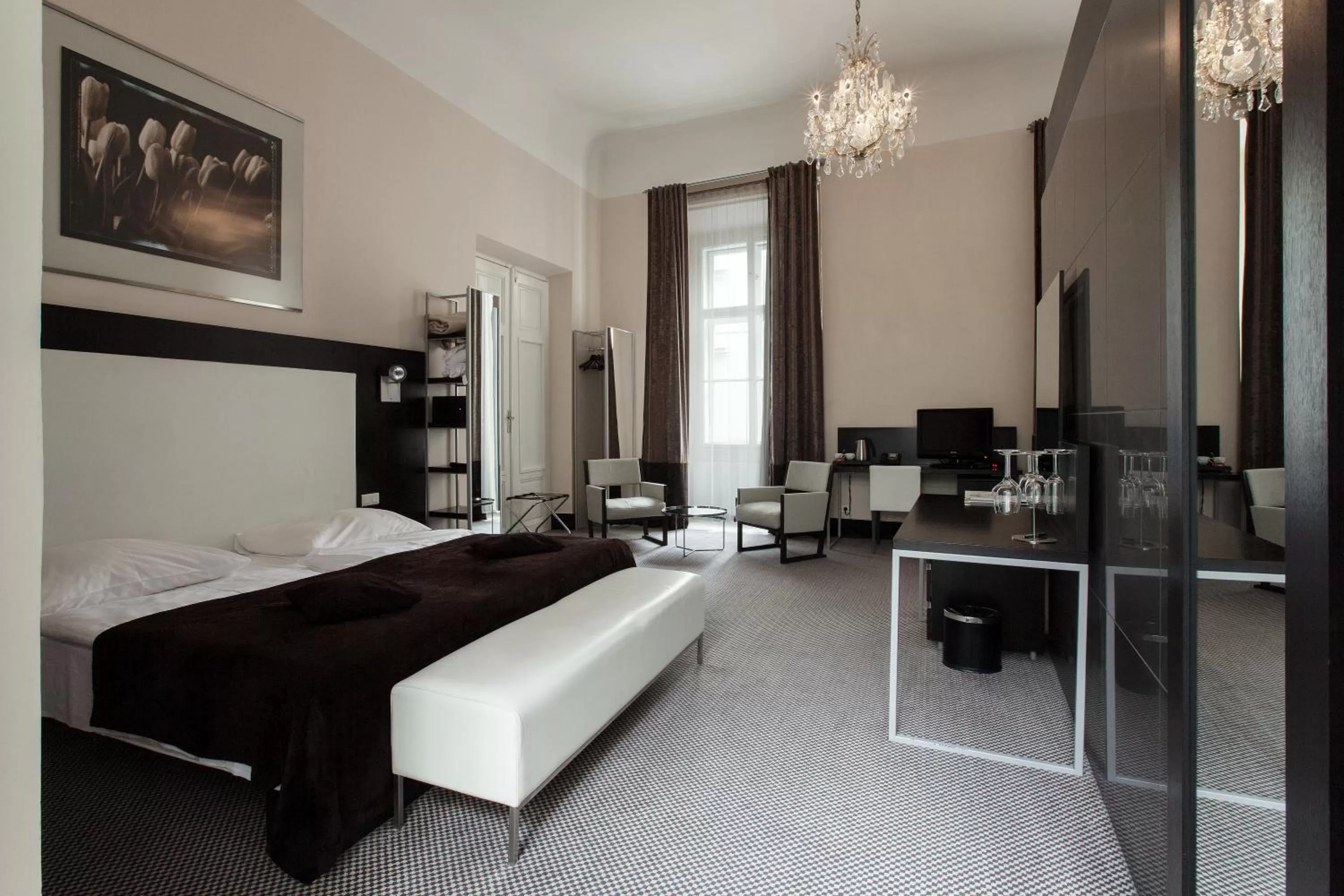 Photo of the whole room, Bed in Old Town Square Residence by Emblem