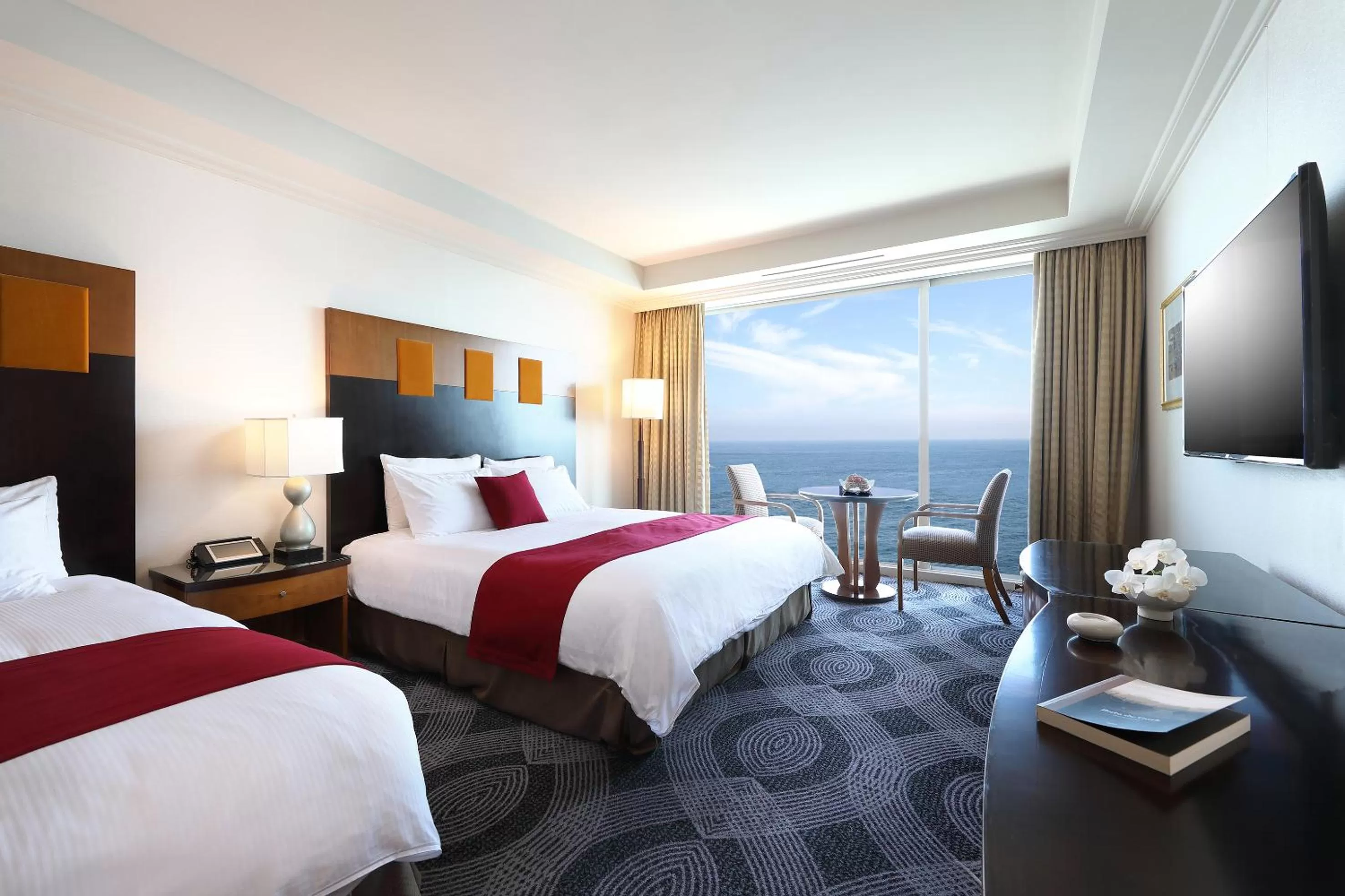 Photo of the whole room in Ramada Plaza by Wyndham Jeju Ocean Front