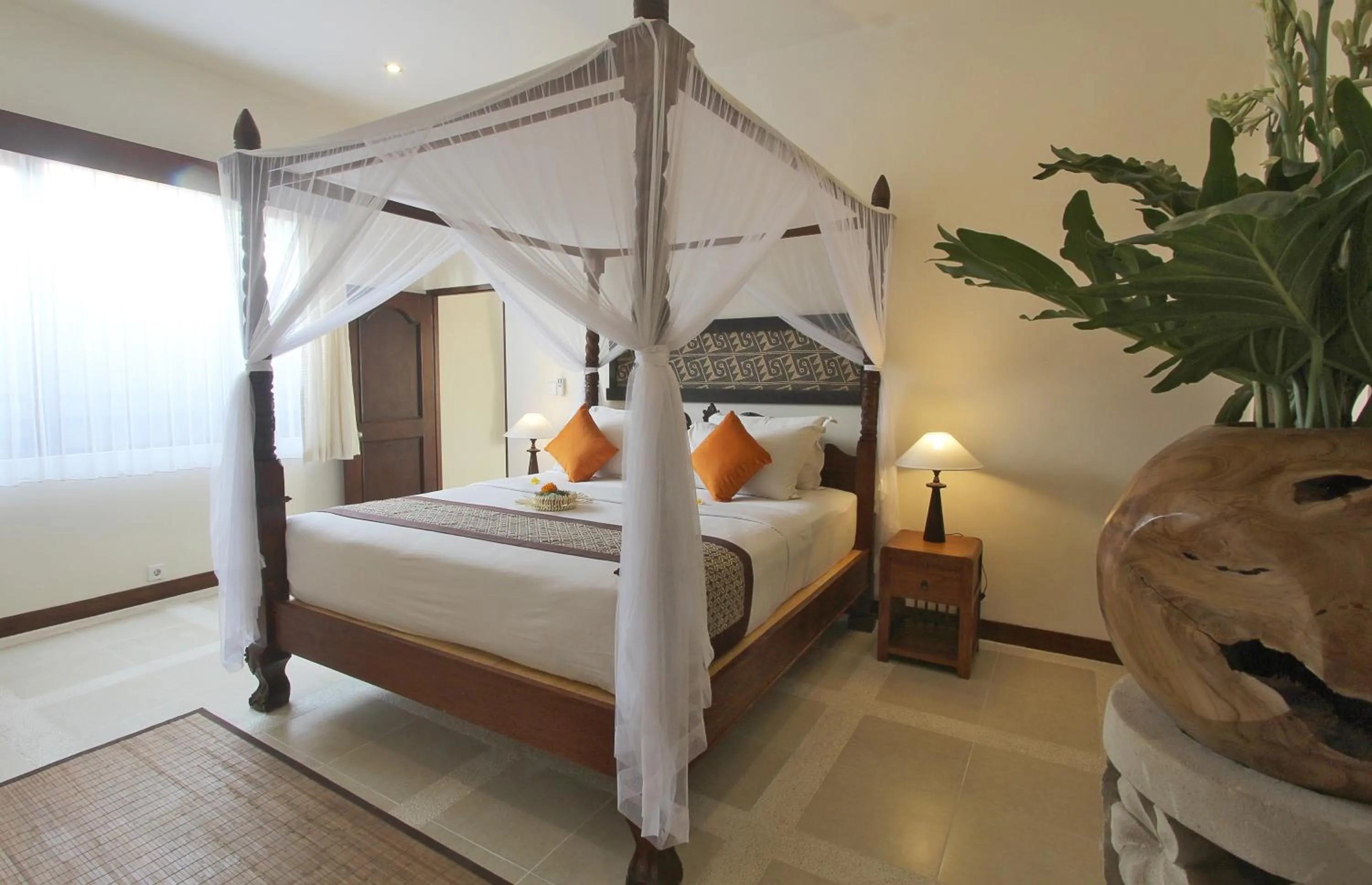 Bed in D'Legon Villas