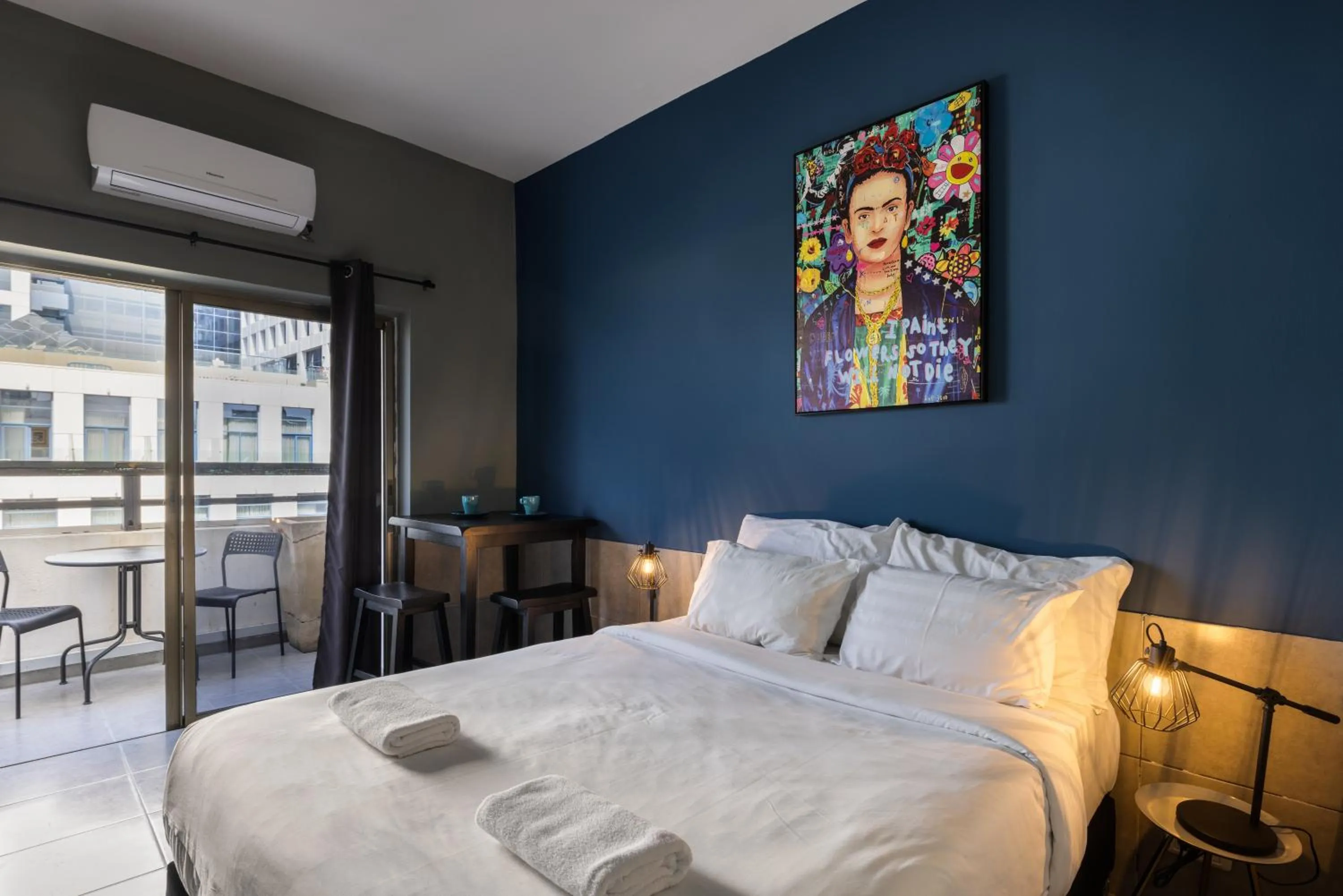 Photo of the whole room, Bed in Liber Tel Aviv Sea Shore Suites BY RAPHAEL HOTELS