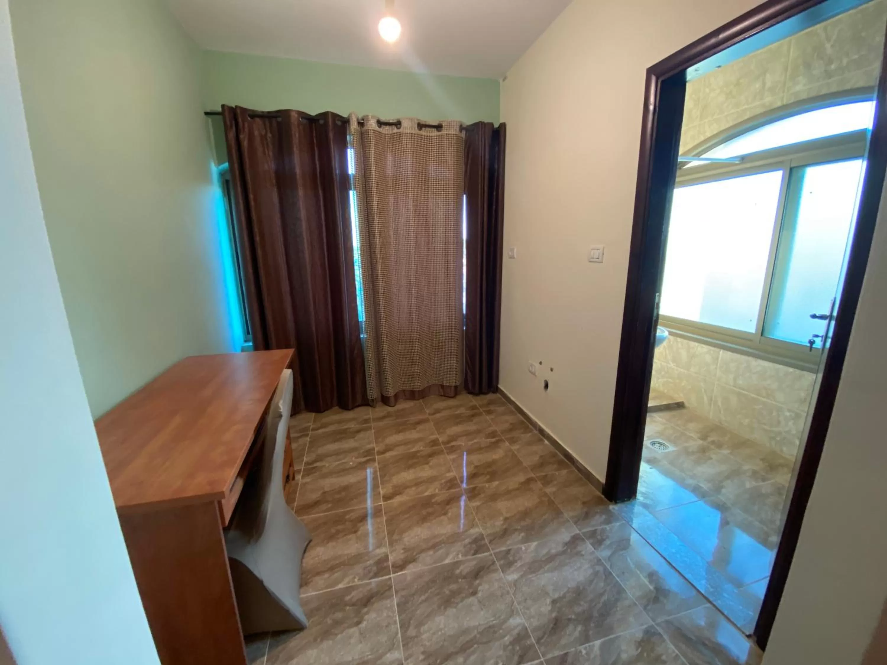 TV/Entertainment Center in Jericho Waleed's Hostel