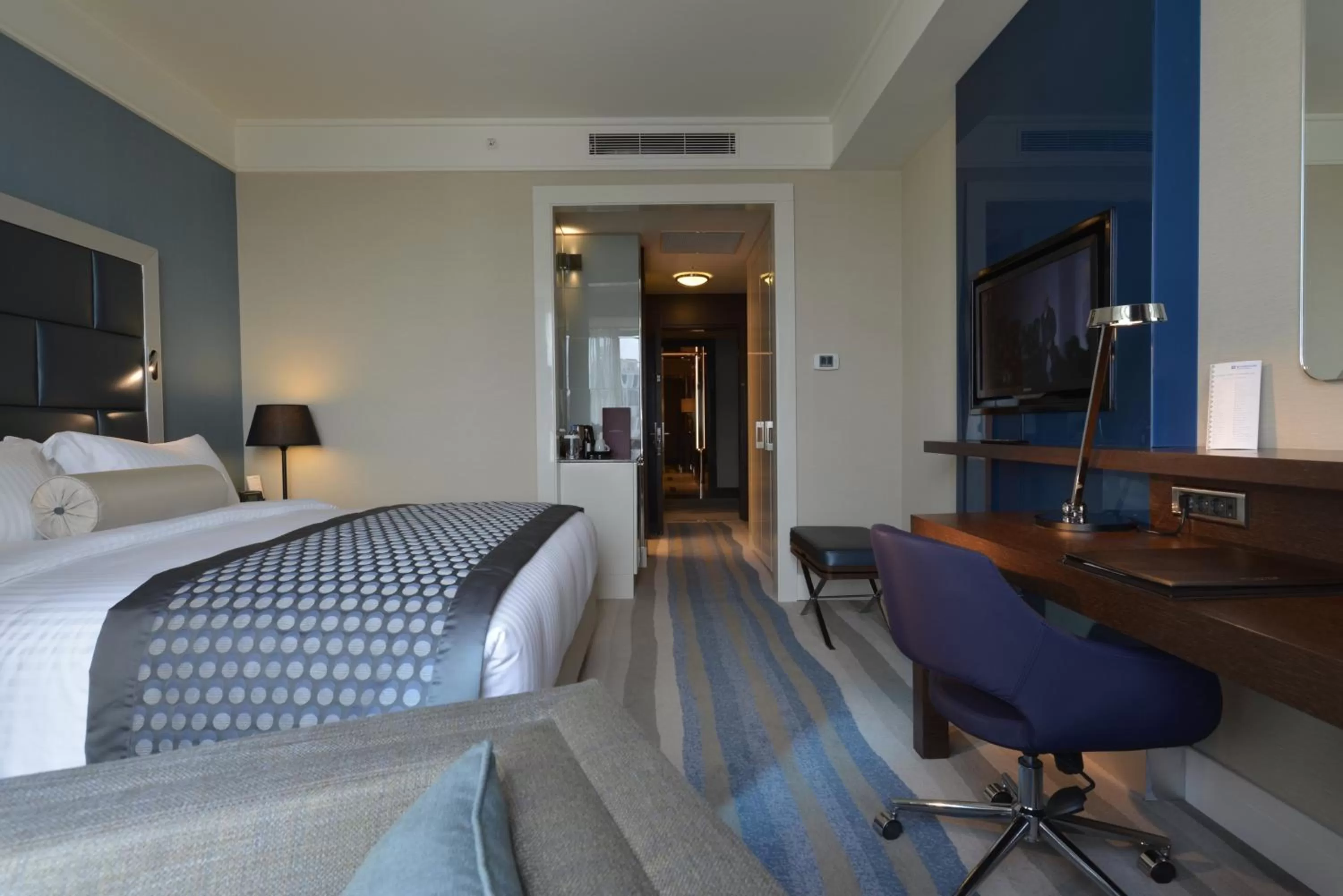 Bed in Wyndham Grand Istanbul Europe