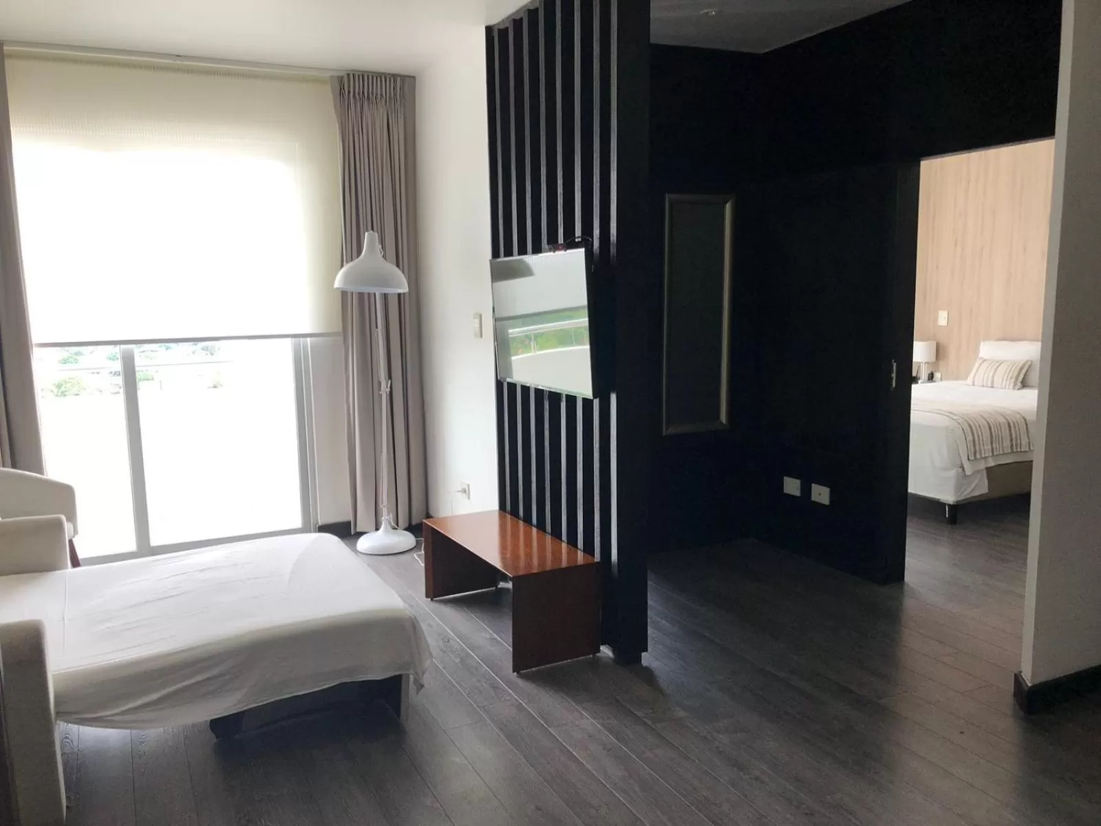 Bed in Urban Suites Apart Hotel