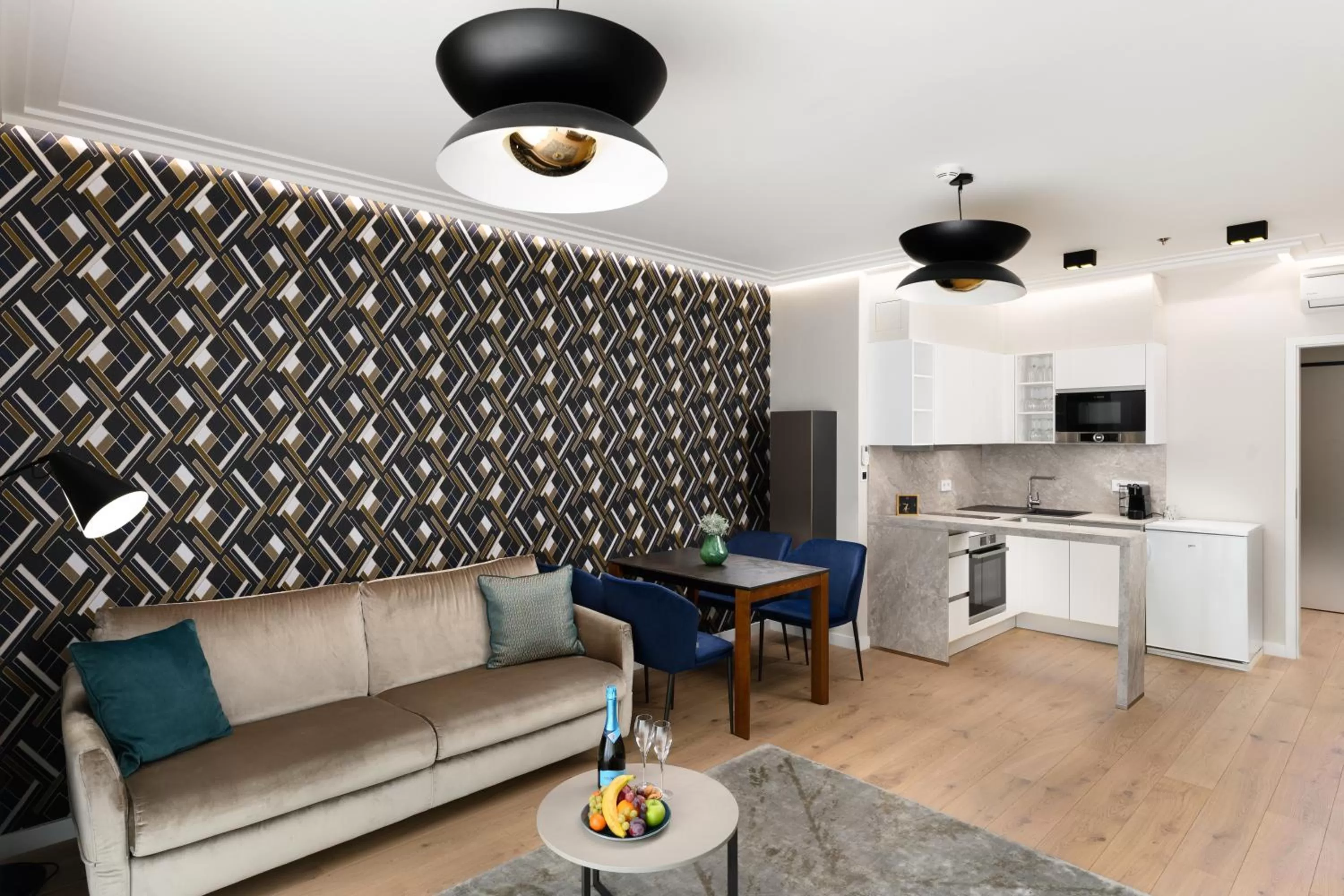 Living room in Emerald Downtown Luxury Suites by Continental Group