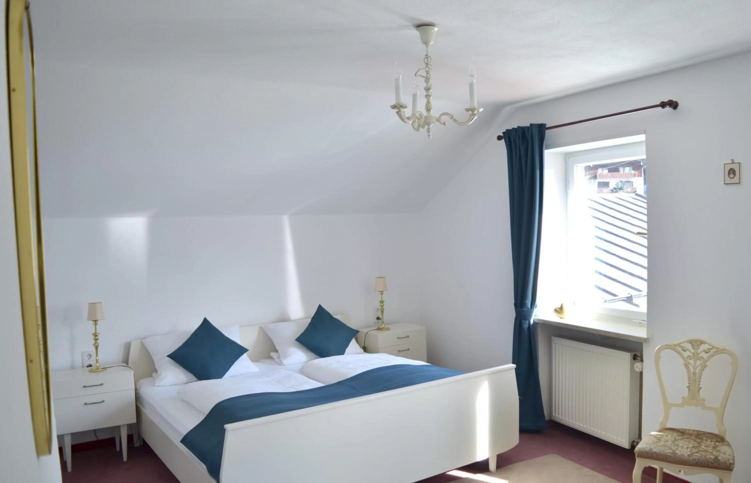 Bed in Pension und Ferienwohnung Frech